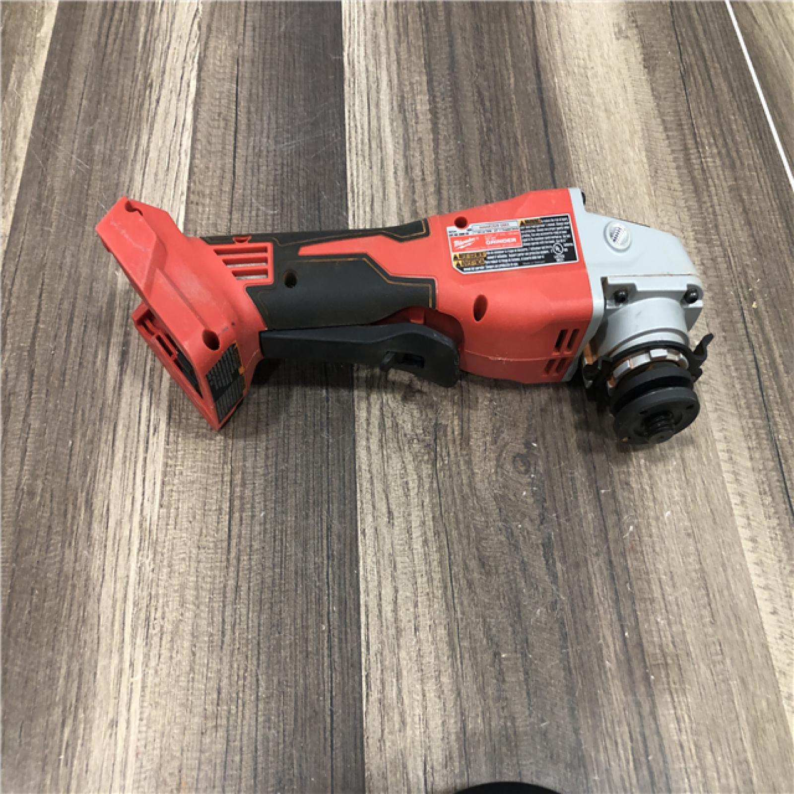 AS-IS Milwaukee 18V Lithium-Ion Brushless Cordless 4-1/2 in./5 in. Grinder w/Paddle Switch (Tool-Only)