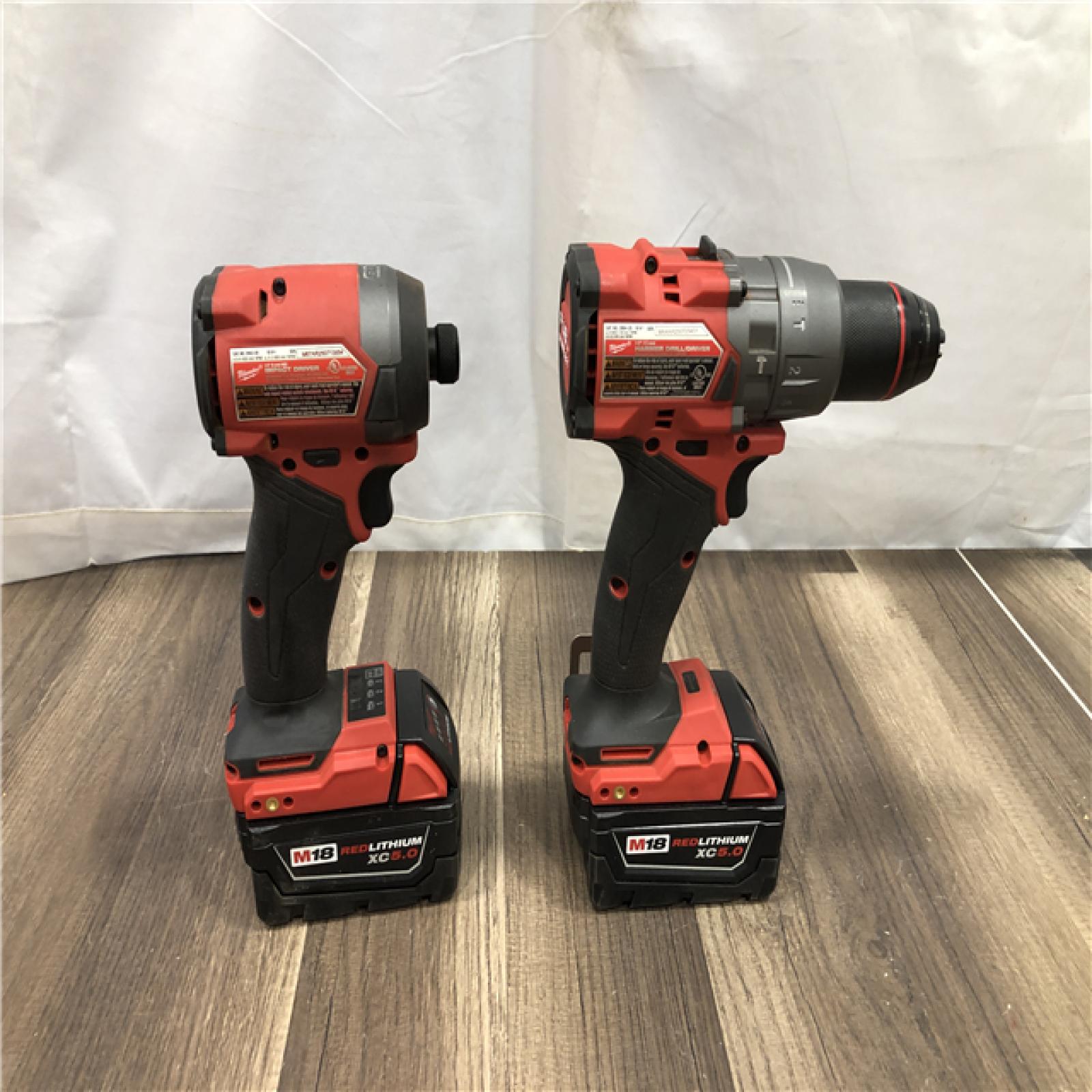AS-IS Milwaukee FUEL 18V Lithium-Ion Brushless Cordless Hammer Drill and Impact Driver Combo Kit
