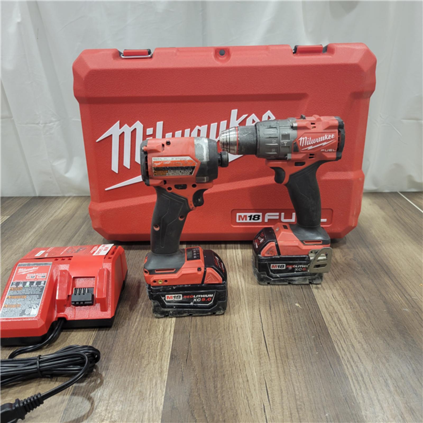 AS-IS Milwaukee M18 FUEL 18V Lithium-Ion Brushless Cordless Hammer Drill and Impact Driver Combo Kit (2-Tool) with 2 Batteries