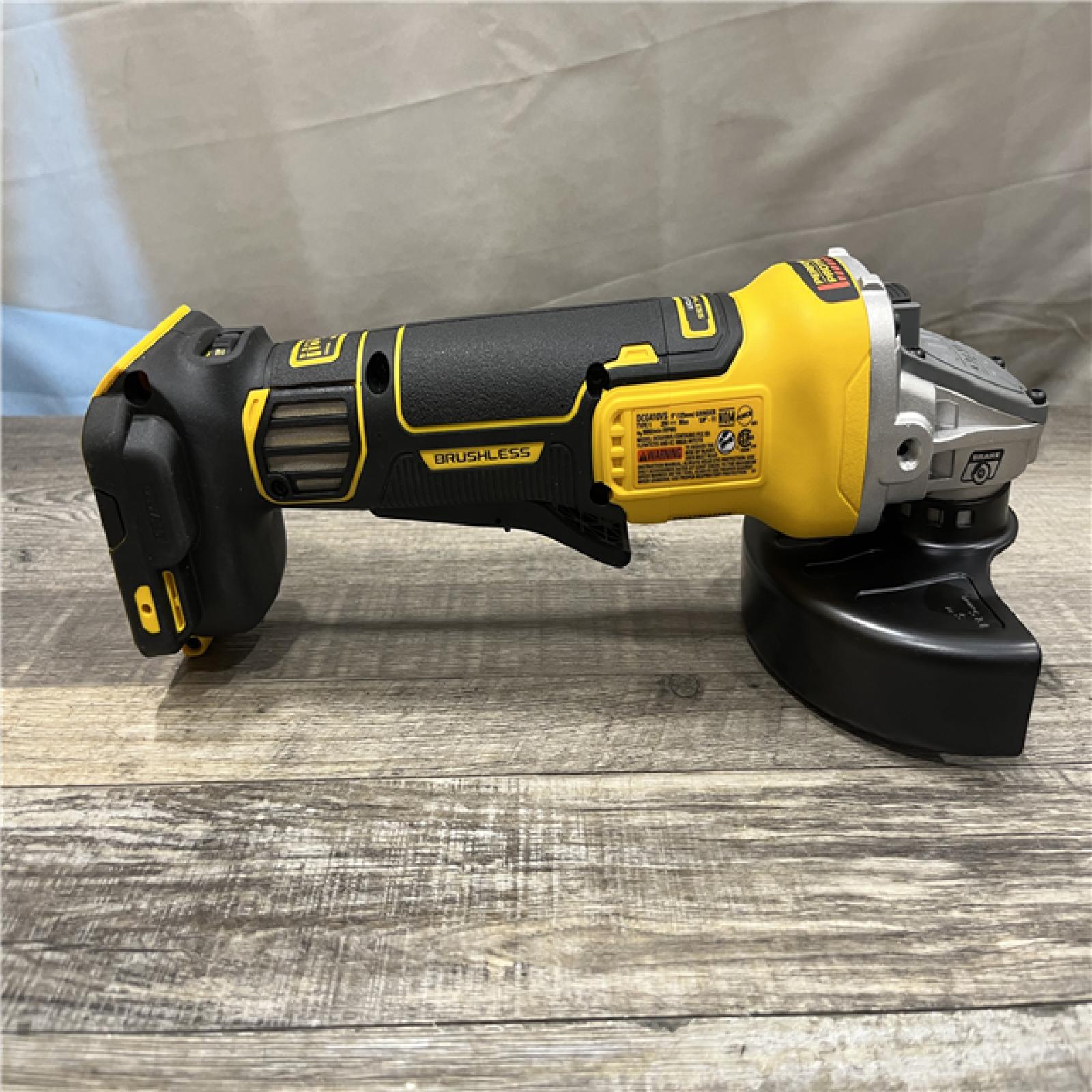 AS-IS DEWALT 20V XR Cordless 4-1/2. in. to 5 in. Variable Speed Angle Grinder (Tool Only)