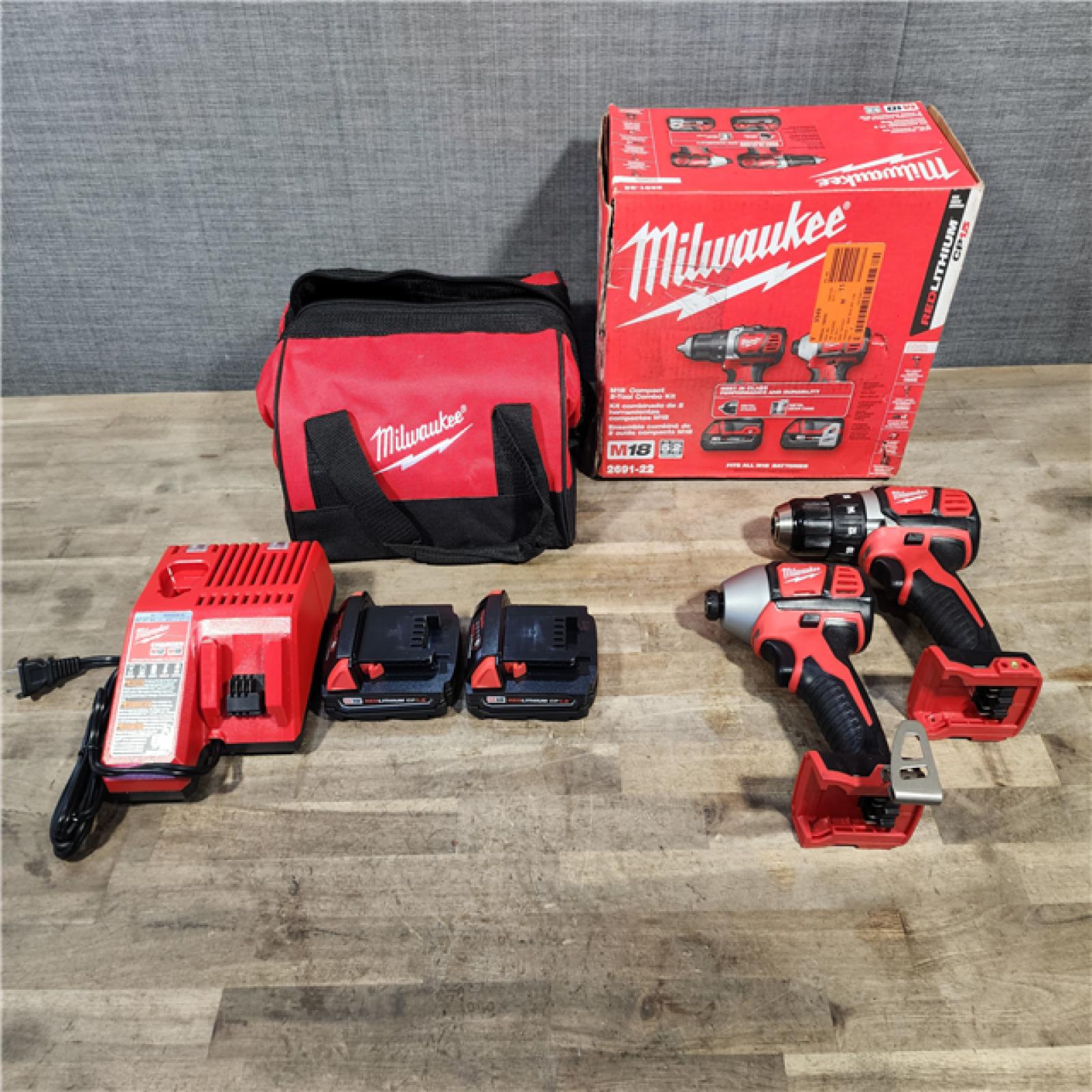 HOUSTON LOCATION - AS-IS Milwaukee 18V Cordless Brushed 2-Tool Drill/Driver and Impact Driver Kit