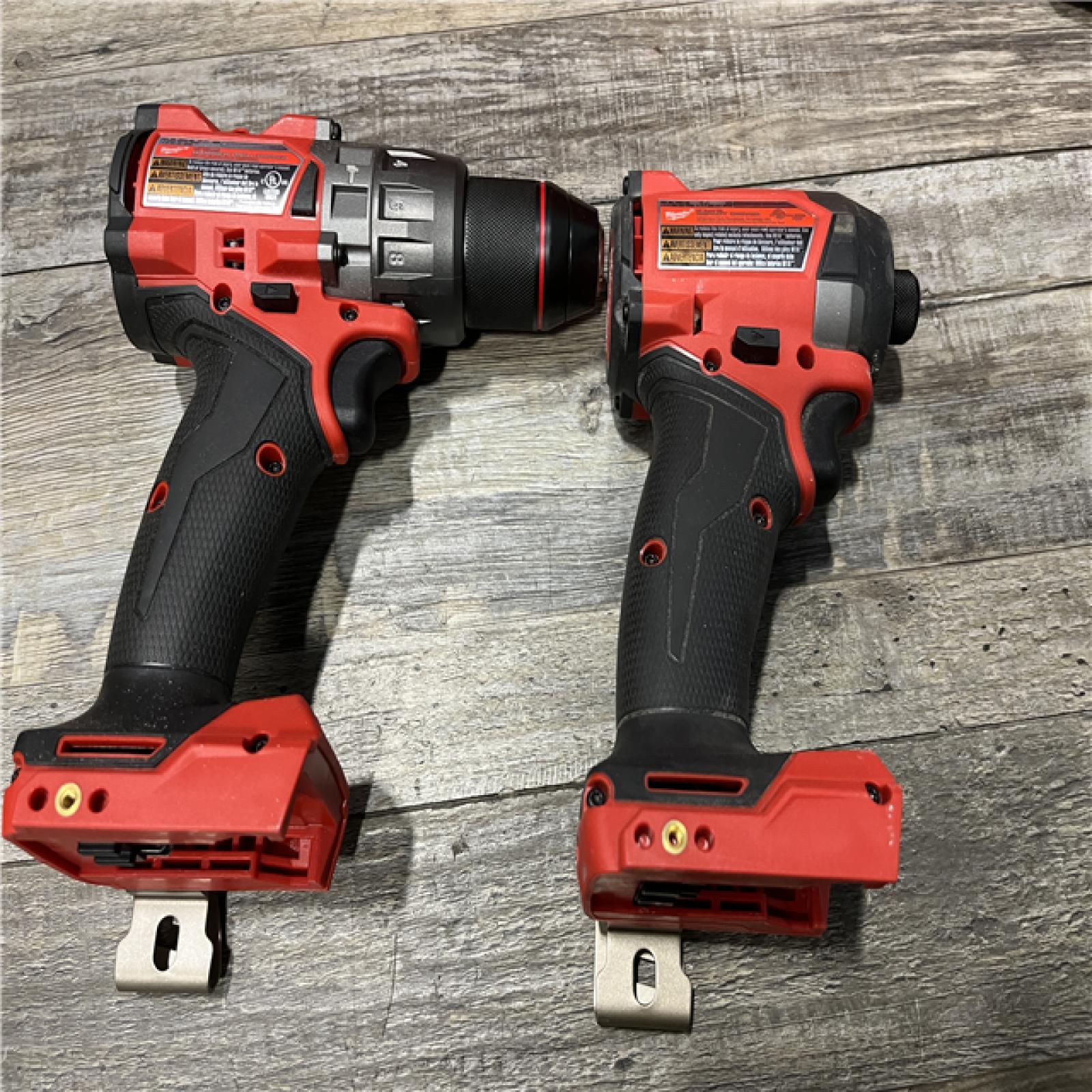 AS-IS Milwaukee FUEL 18V Lithium-Ion Brushless Cordless Hammer Drill and Impact Driver Combo Kit