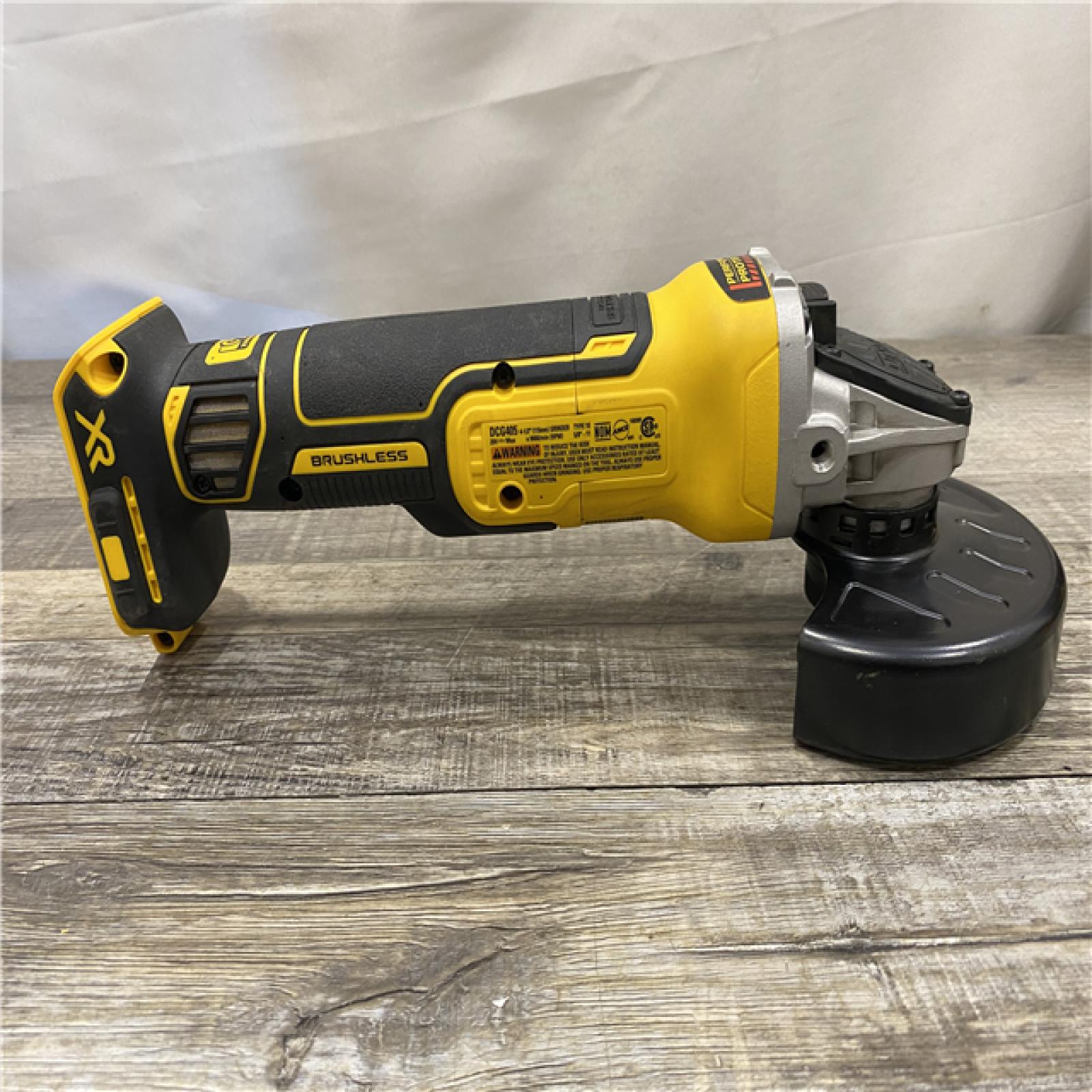 AS-IS DEWALT 20V MAX XR Cordless Brushless 4.5 in. Slide Switch Small Angle Grinder with Kickback Brake (Tool Only)