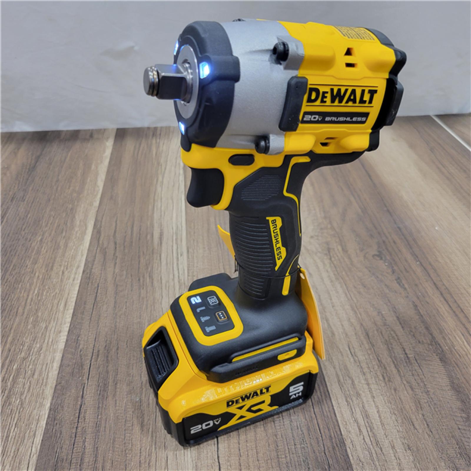 LIKE NEW! DEWALT ATOMIC 20V MAX Lithium-Ion Brushless Cordless 1/2 in. Variable Speed Impact Wrench Kit with 5 Ah Battery and Charger