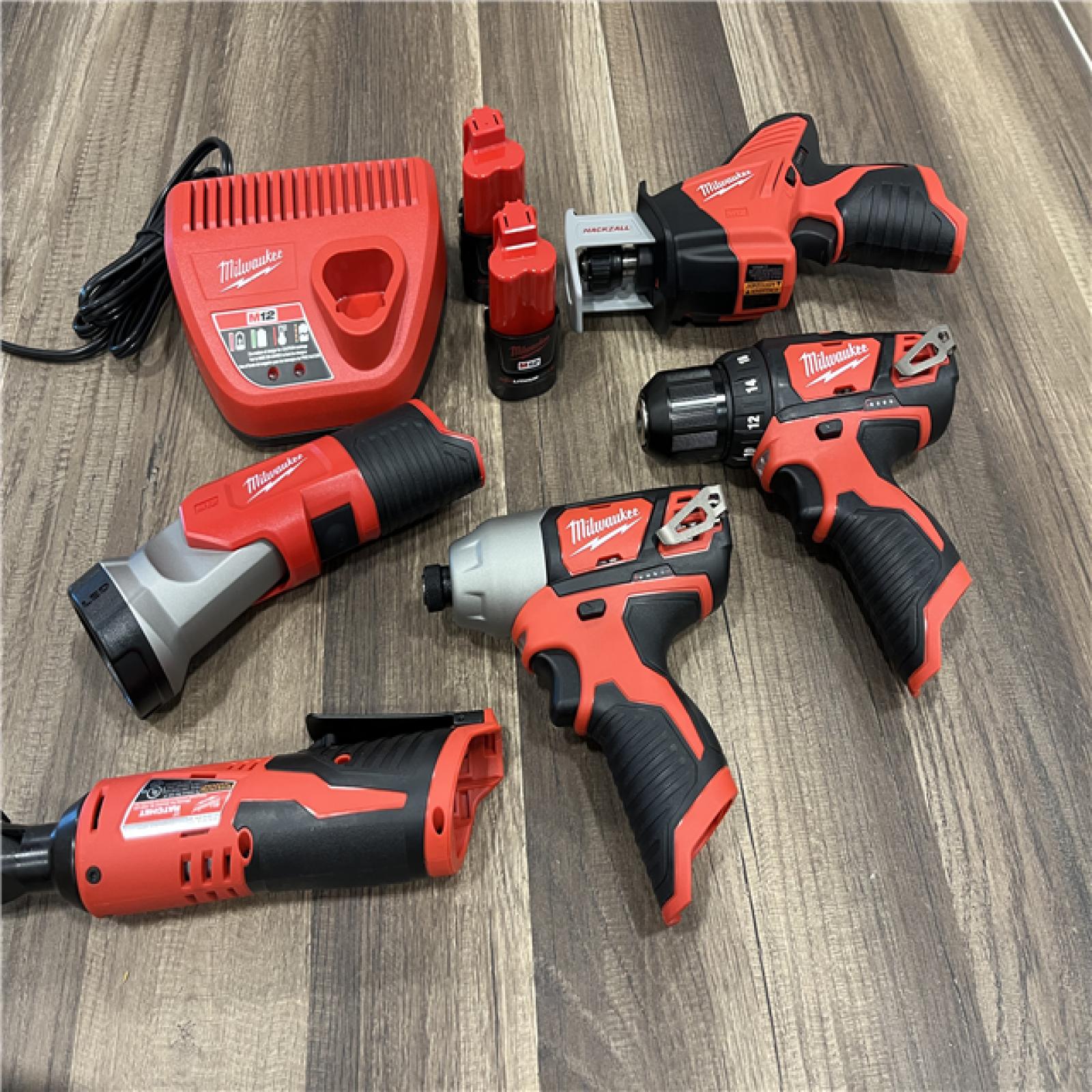 AS-IS MILWAUKEE M12 12V Lithium-Ion Cordless Combo Kit (5-Tool) with Two 1.5Ah Batteries, Charger & Tool Bag