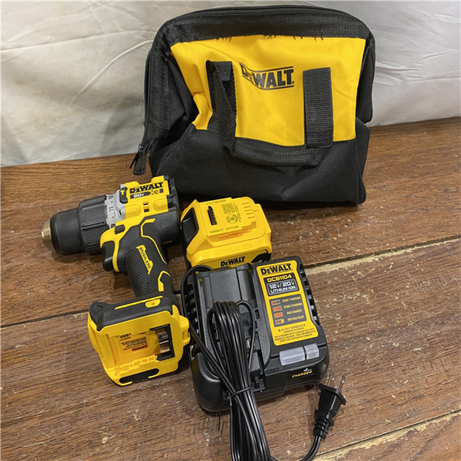 AS-IS DEWALT 20V MAX XR Hammer Drill and ATOMIC Impact Driver 2 Tool Cordless Combo Kit with (2) 4.0Ah Batteries, Charger, and Bag