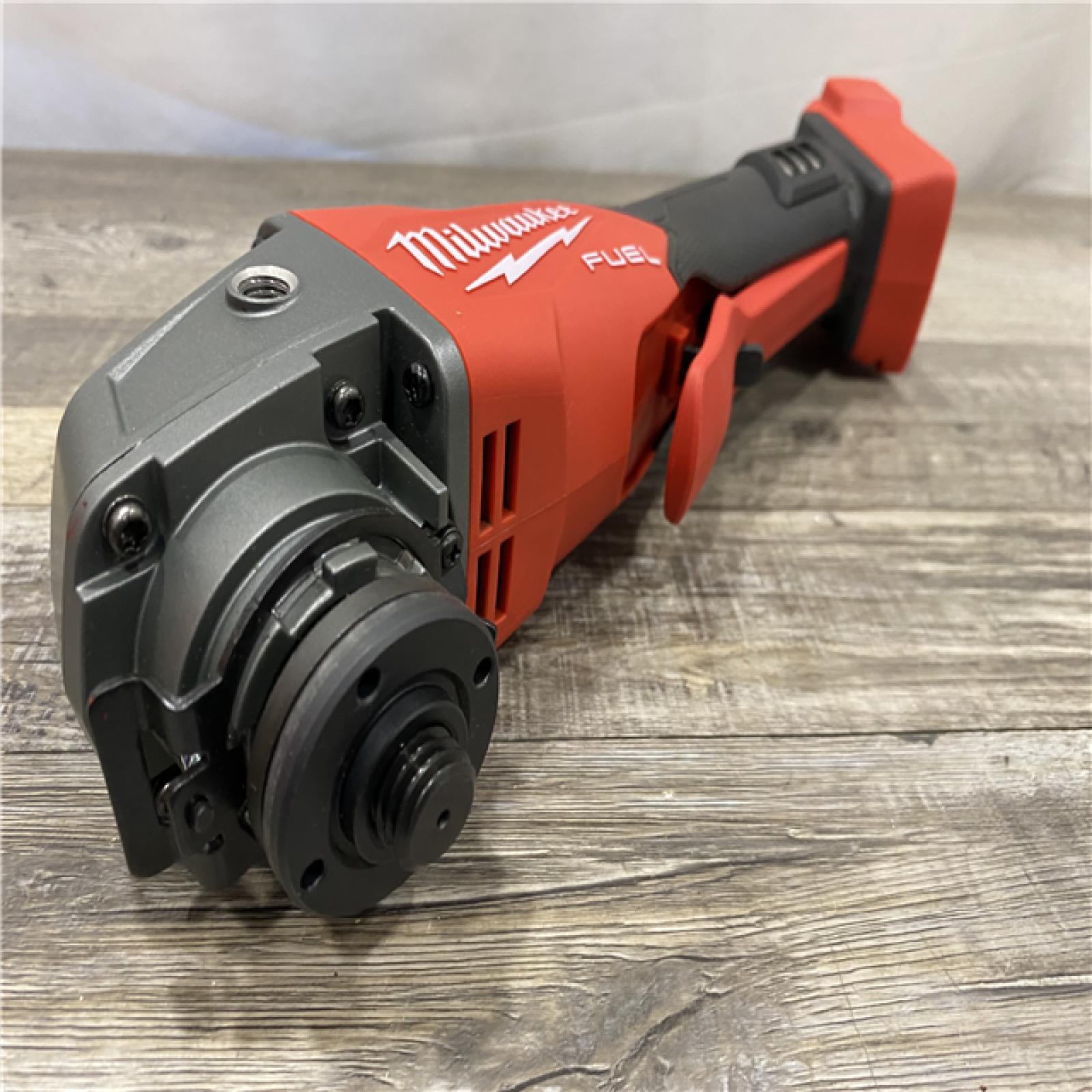AS-IS Milwaukee FUEL 18V Lithium-Ion Brushless Cordless 4-1/2 in./5 in. Grinder with Variable Speed & Paddle Switch (Tool-Only)