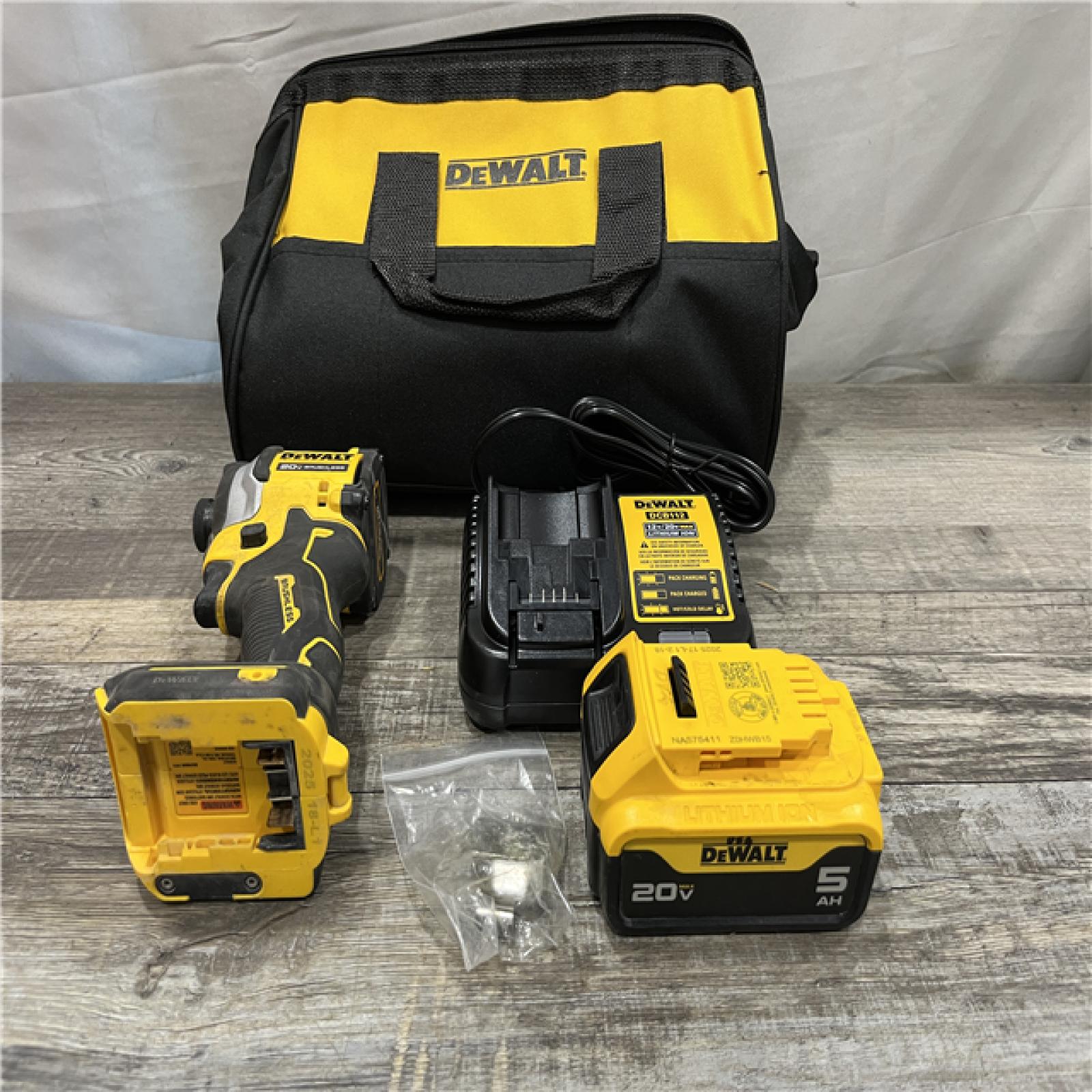 AS-IS DEWALT ATOMIC 20V MAX Lithium-Ion Cordless 1/4 in. Brushless Impact Driver Kit