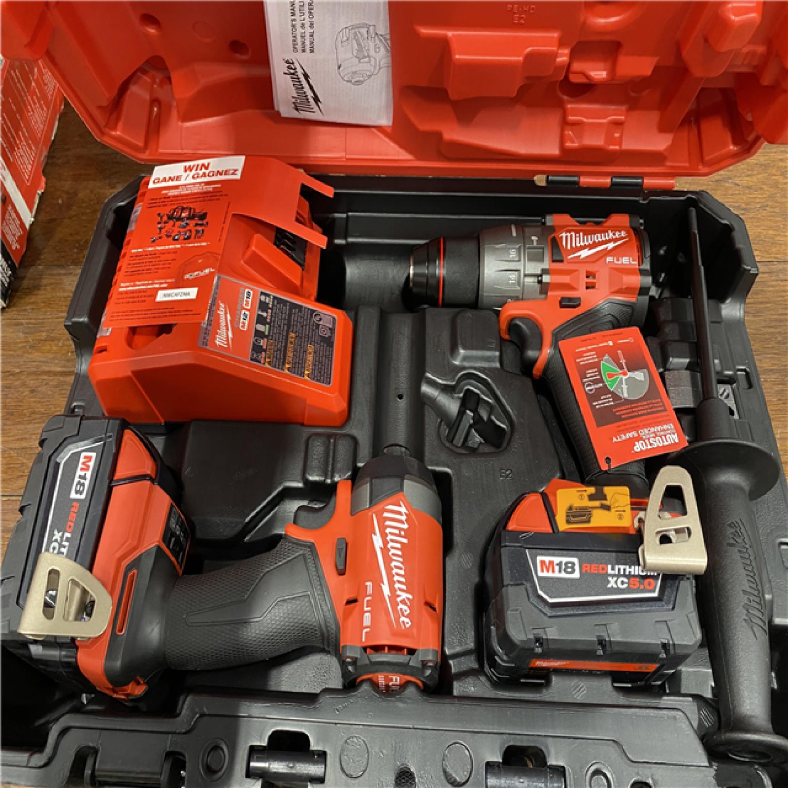 AS-IS M18 FUEL 18V Lithium-Ion Brushless Cordless Hammer Drill and Impact Driver Combo Kit (2-Tool) with 2 Batteries
