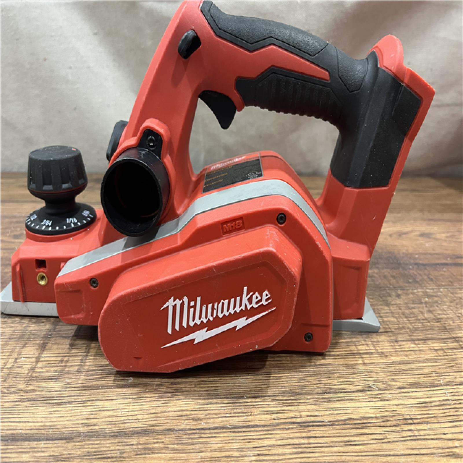 AS-IS Milwaukee M18 18-Volt Lithium-Ion Cordless 3-1/4 in. Planer (Tool-Only)