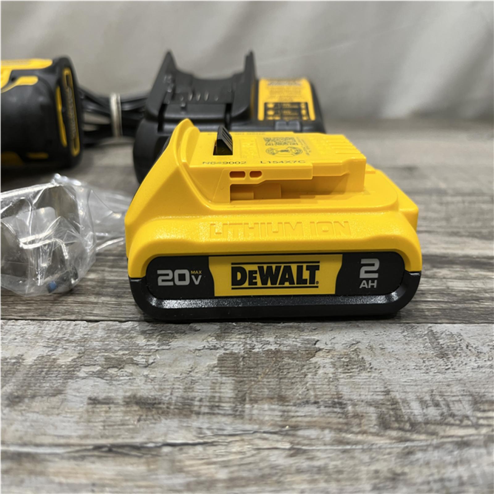 AS-IS DEWALT Atomic 20V Max Lithium-Ion Brushless Cordless Compact 1/4 in. Impact Driver Kit