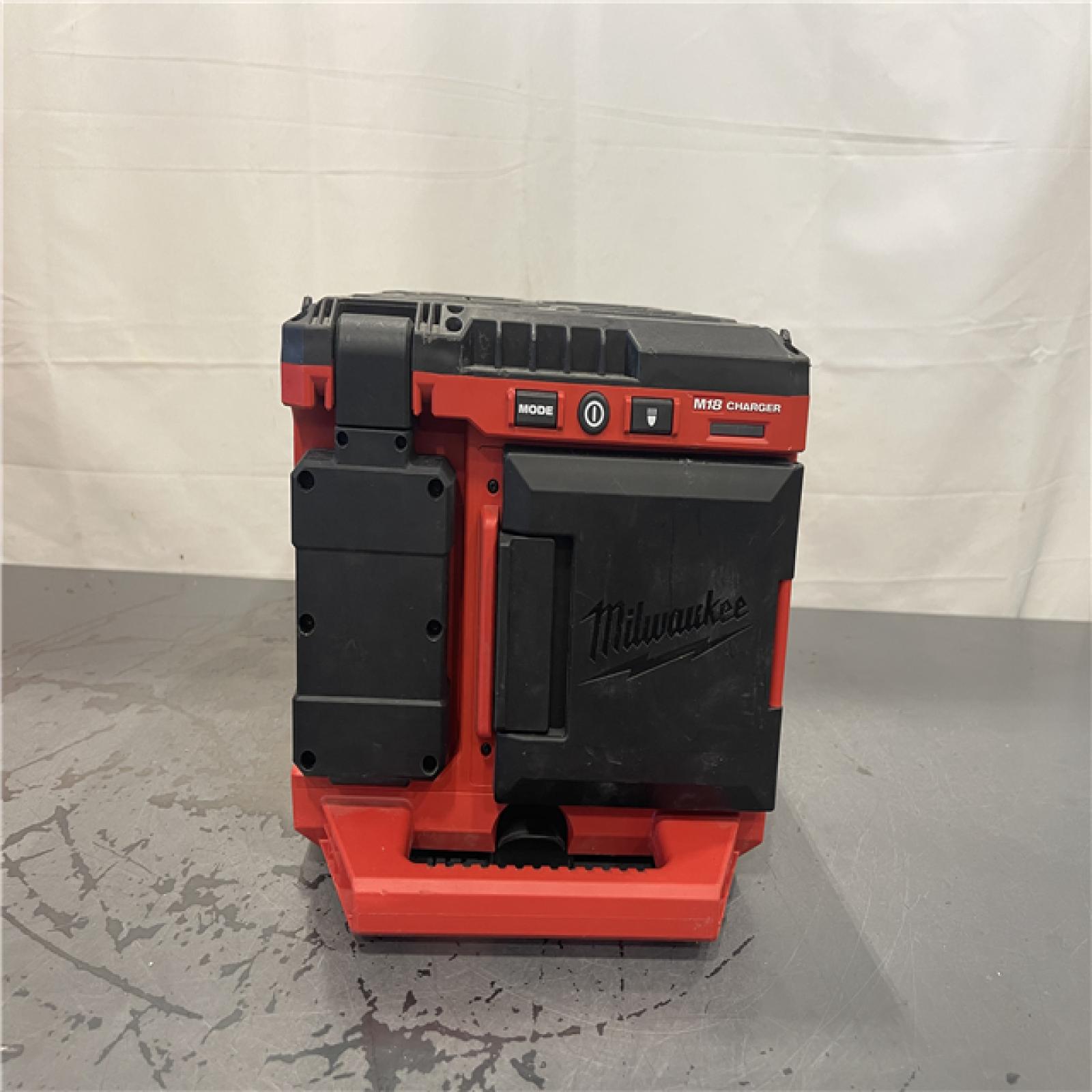 AS-IS- Milwaukee  M18 PACKOUT Cordless Lithium-Ion Light/Charger (Tool Only)