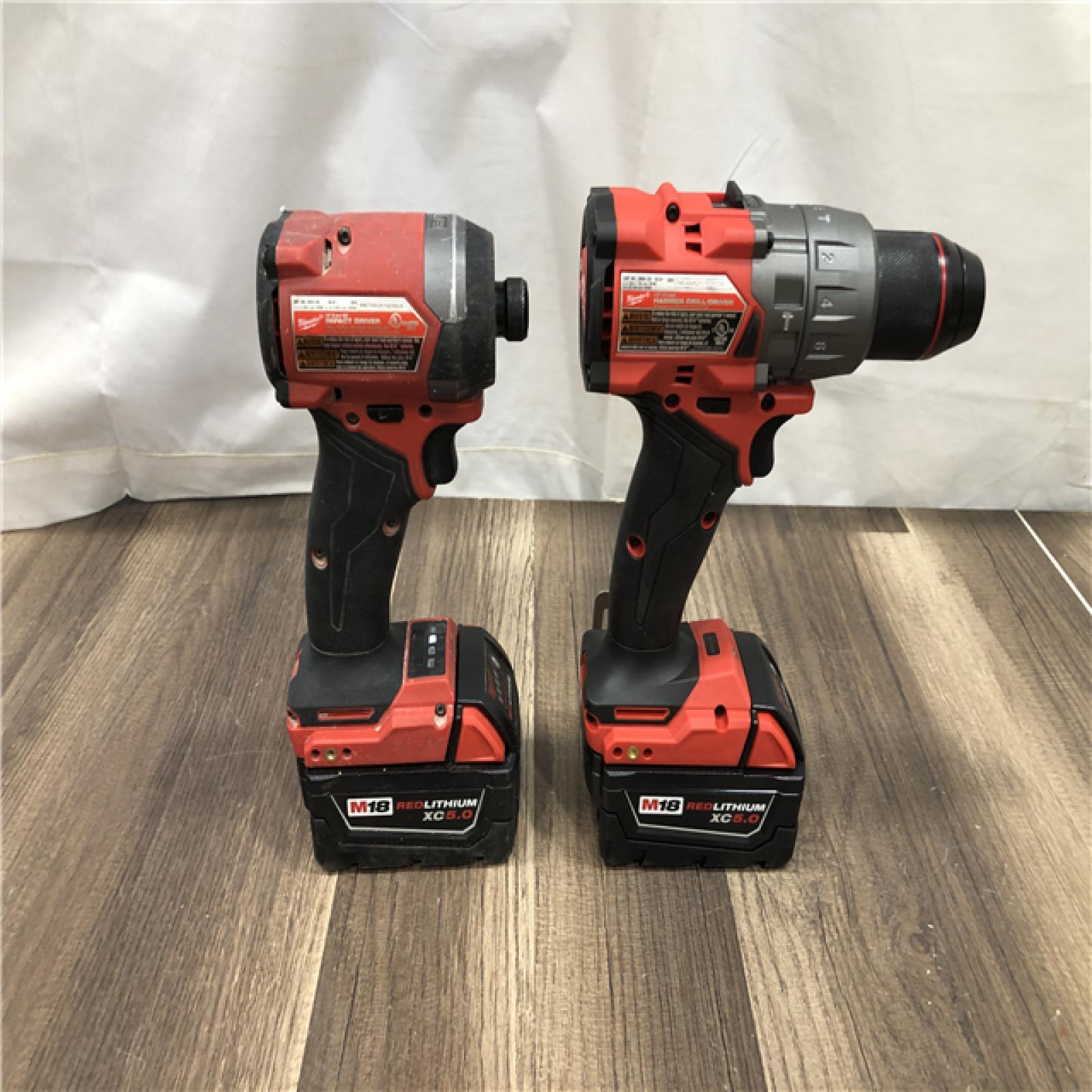 AS-IS Milwaukee FUEL 18V Lithium-Ion Brushless Cordless Hammer Drill and Impact Driver Combo Kit