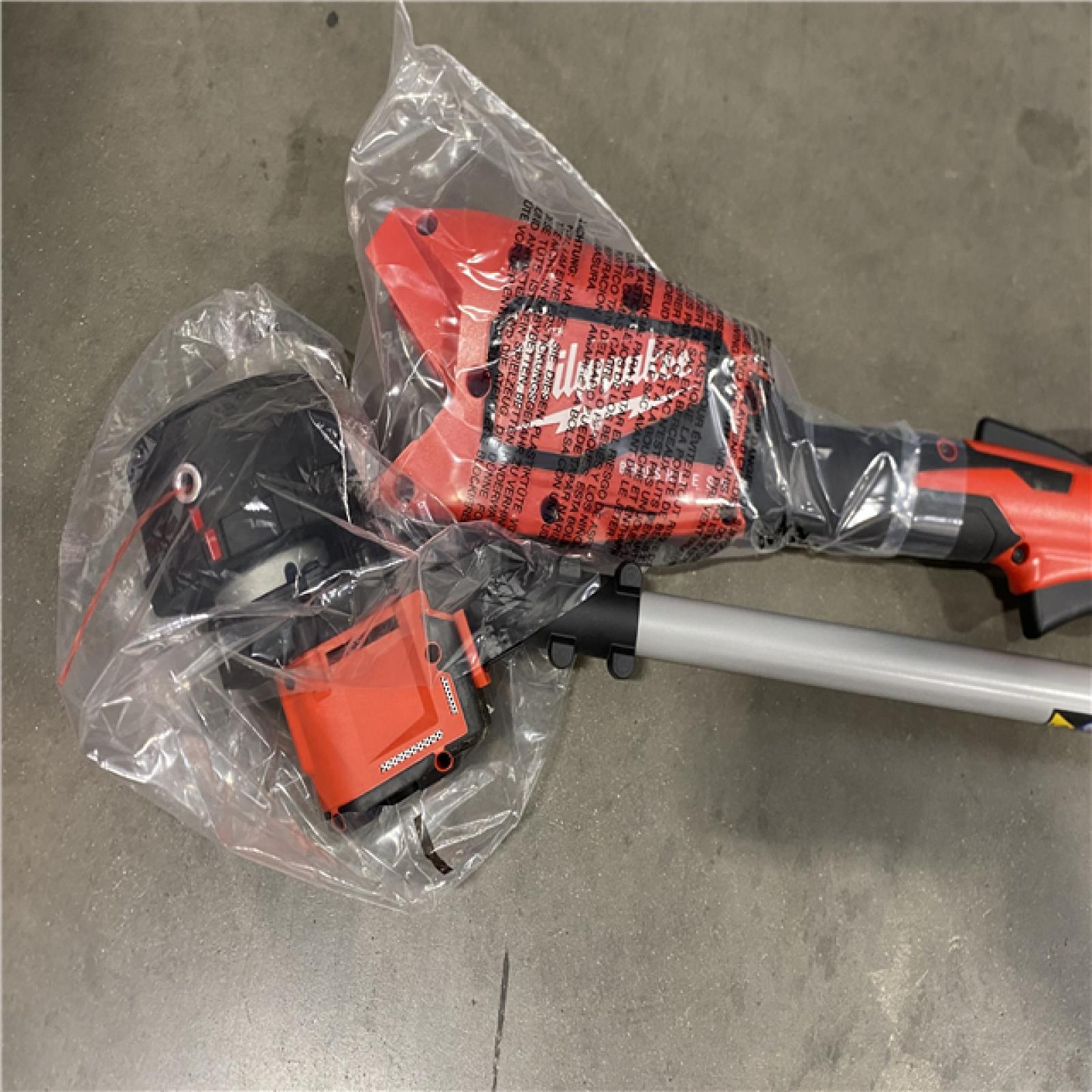 AS-IS Milwaukee Brushless 18V 16 in. Cordless Battery Powered String Trimmer Kit