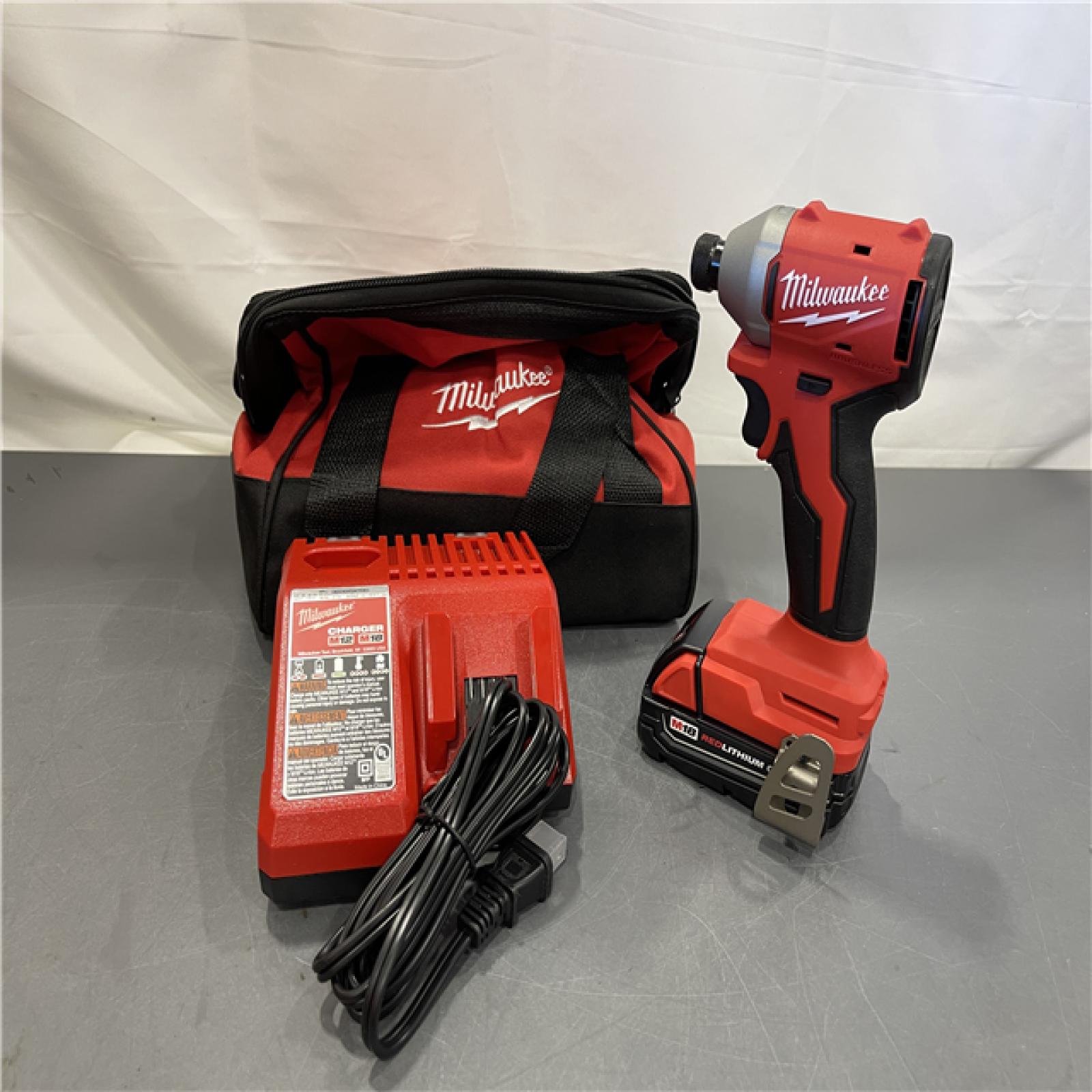 AS-IS - Milwaukee M18 Compact Brushless 1/4  Hex Impact Driver Kit