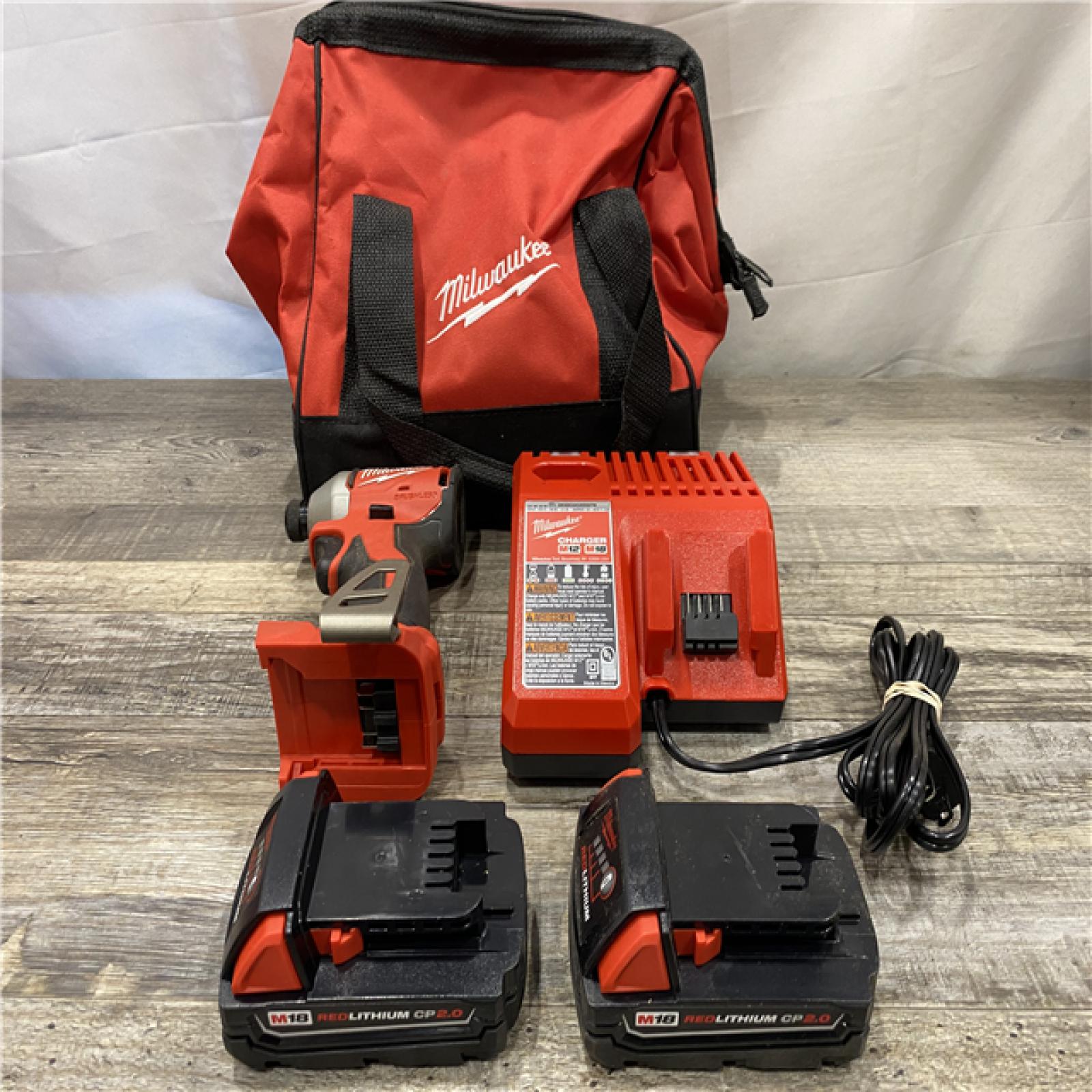 AS-IS Milwaukee 18V Lithium-Ion Brushless Cordless 1/4 in. Impact Driver Kit