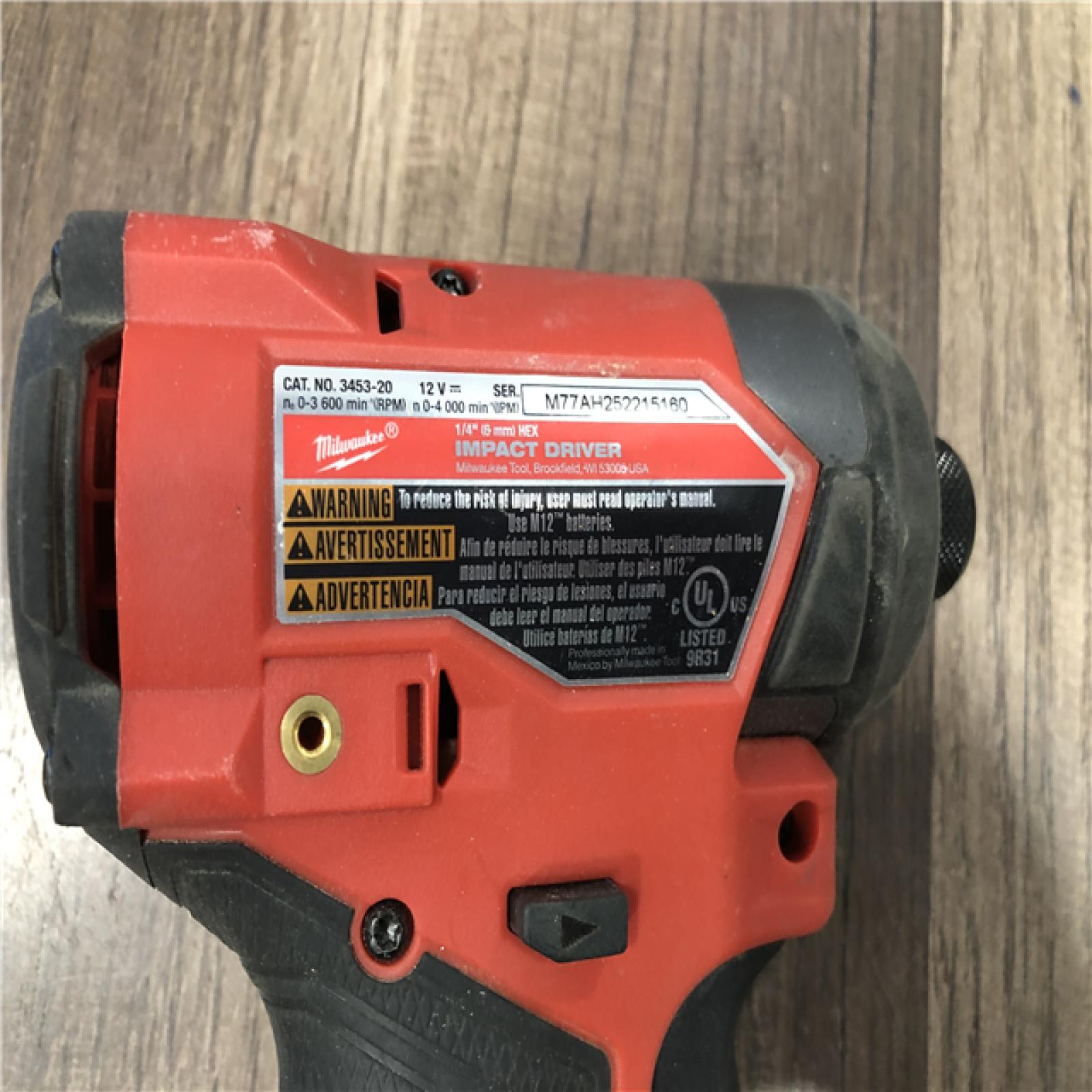 AS-IS Milwaukee  FUEL 12V Lithium-Ion Brushless Cordless 1/4 in. Hex Impact Driver (Tool-Only)