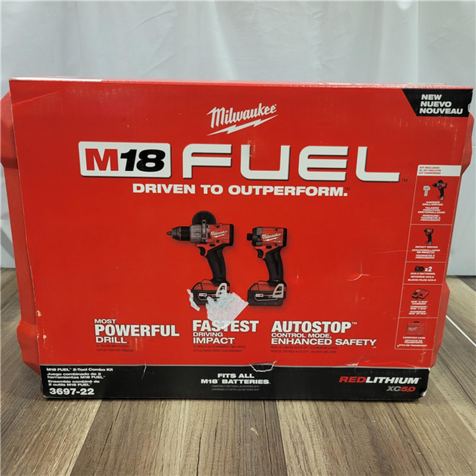 AS-IS Milwaukee M18 FUEL 18V Lithium-Ion Brushless Cordless Hammer Drill and Impact Driver Combo Kit (2-Tool) with 2 Batteries