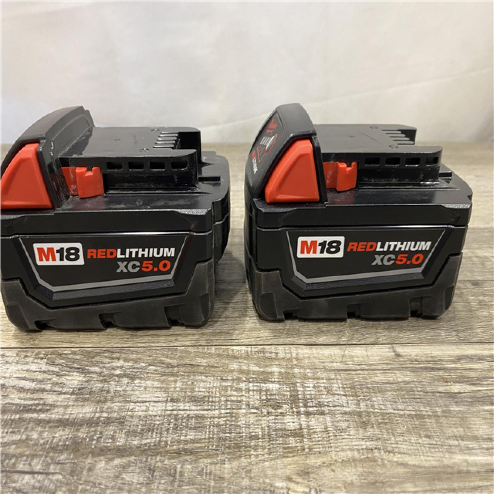 AS-IS Milwaukee 18-Volt Lithium-Ion XC Starter Kit with Two 5.0Ah Batteries and Charger