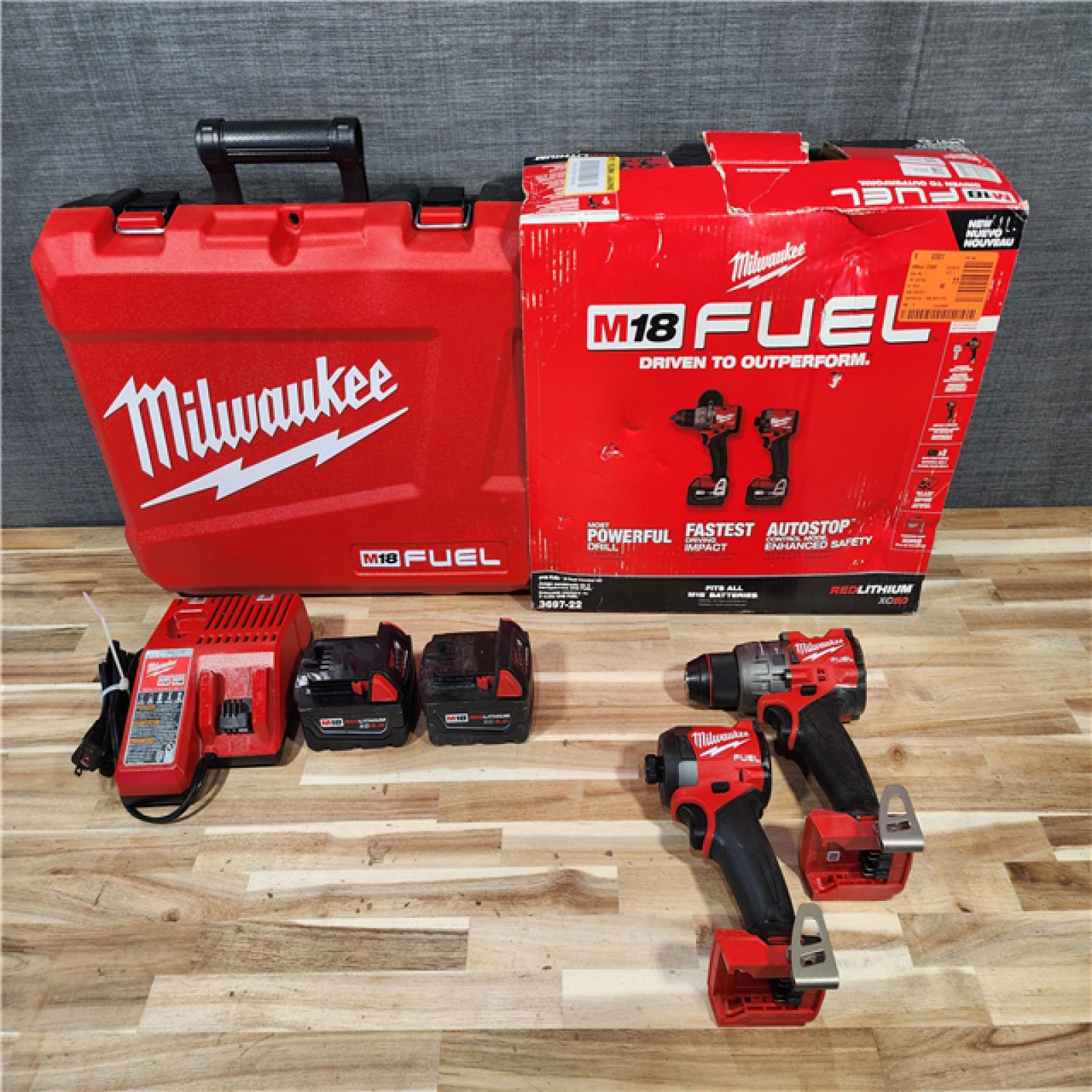 HOUSTON LOCATION - AS-IS Milwaukee FUEL 18V Lithium-Ion Brushless Cordless Hammer Drill and Impact Driver Combo Kit