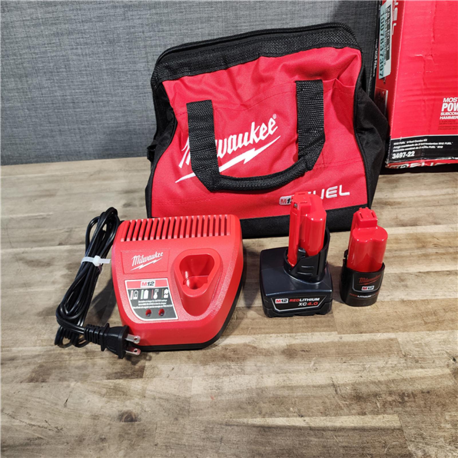 HOUSTON LOCATION - AS-IS Milwaukee 3497-22 12V Brushless Hammer Drill and Impact Driver Combo Kit