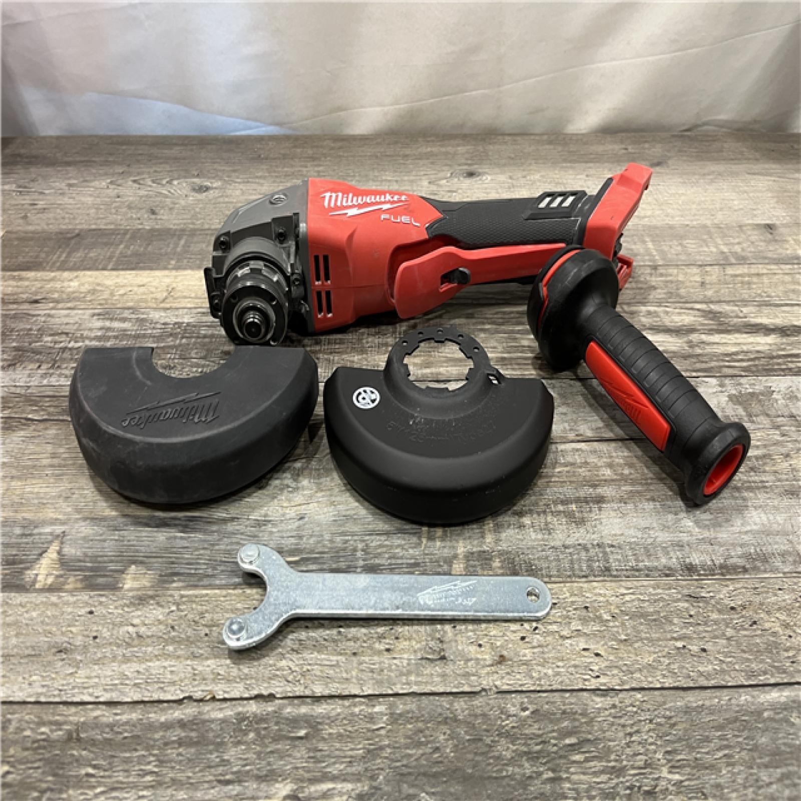 AS-IS Milwaukee FUEL 18V Lithium-Ion Brushless Cordless 4-1/2 in./5 in. Grinder with Variable Speed & Paddle Switch (Tool-Only)