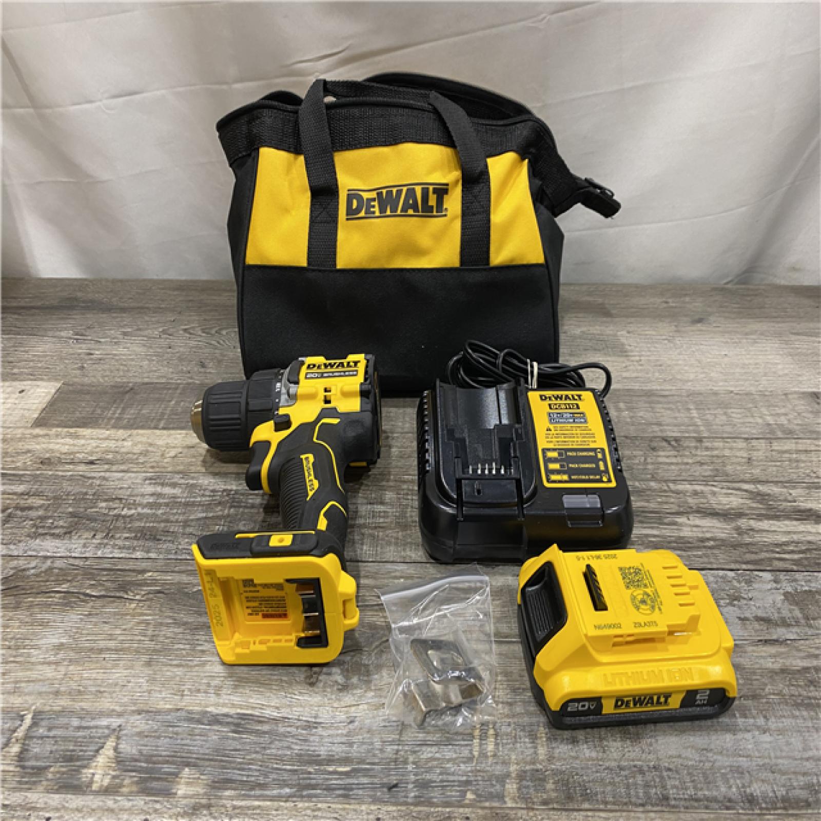 AS-IS DEWALT Atomic 20V Max Lithium-Ion Brushless Cordless Compact 1/4 in. Impact Driver Kit
