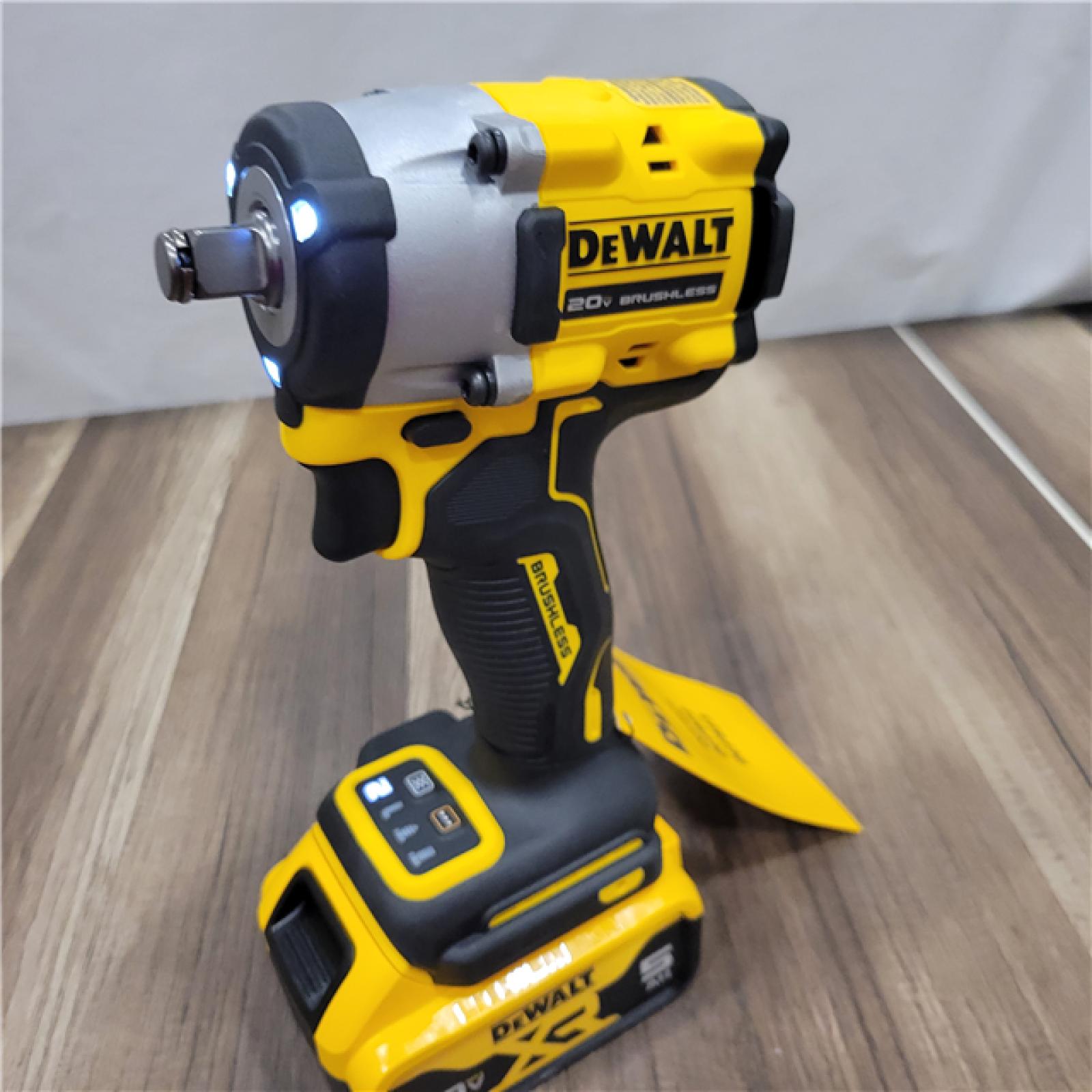 LIKE NEW! DEWALT ATOMIC 20V MAX Lithium-Ion Brushless Cordless 1/2 in. Variable Speed Impact Wrench Kit with 5 Ah Battery and Charger