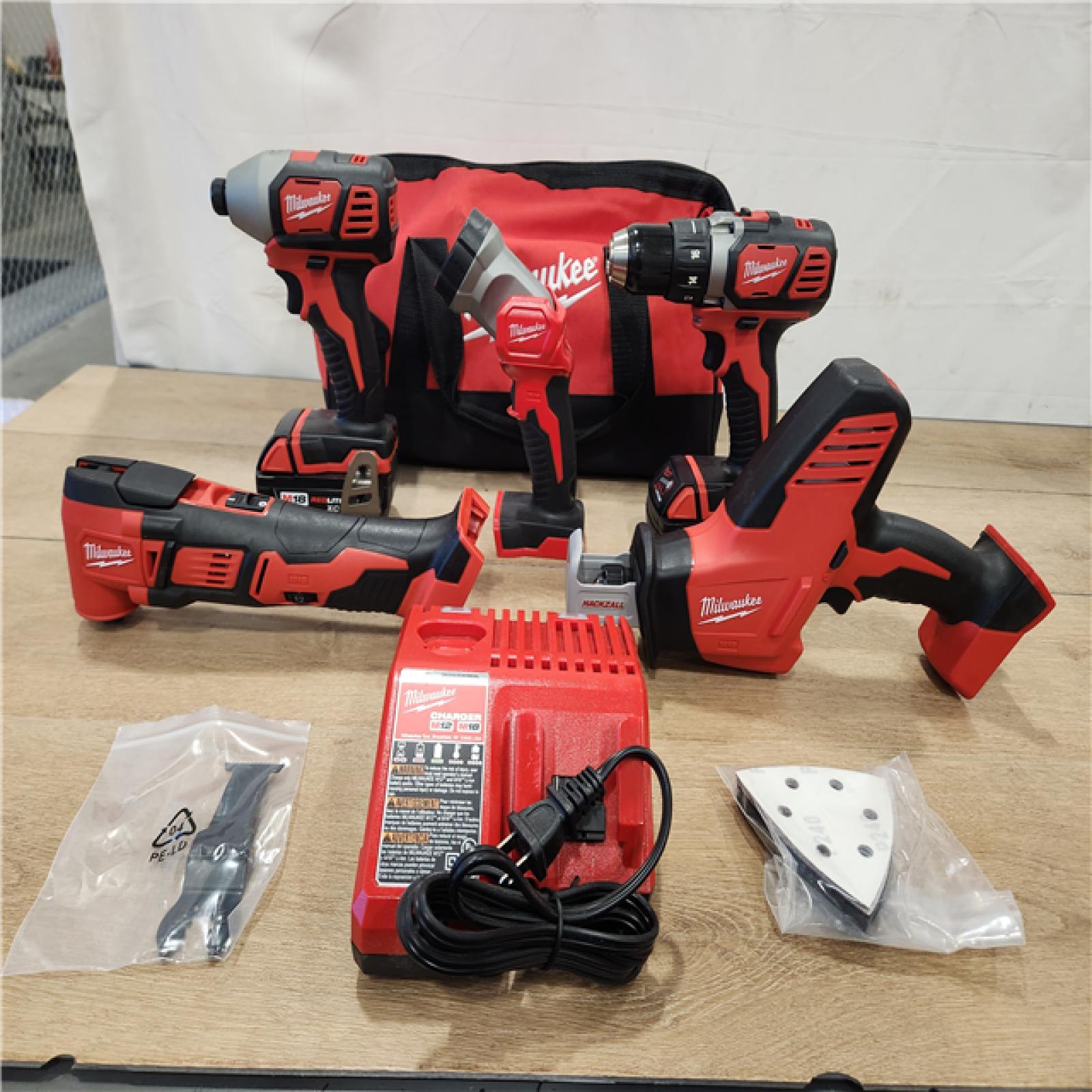 AS-IS- M18 18V Lithium-Ion Cordless Combo Kit (5-Tool) with (2) Batteries  Charger and Tool Bag
