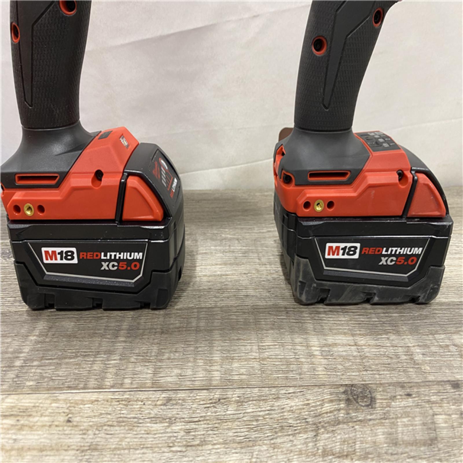 AS-IS Milwaukee FUEL 18V Lithium-Ion Brushless Cordless Hammer Drill and Impact Driver Combo Kit