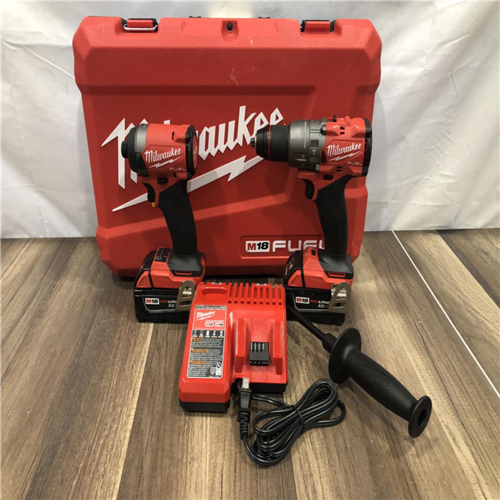AS-IS Milwaukee FUEL 18V Lithium-Ion Brushless Cordless Hammer Drill and Impact Driver Combo Kit