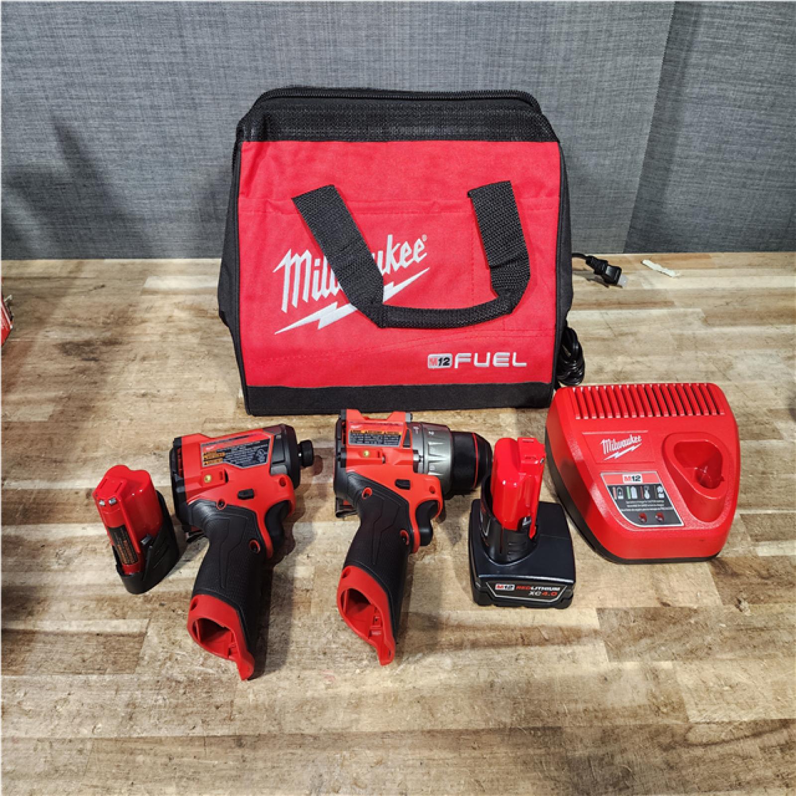 Houston Location AS-IS - Milwaukee FUEL 12-Volt Lithium-Ion Brushless Cordless Hammer Drill and Impact Driver Combo Kit