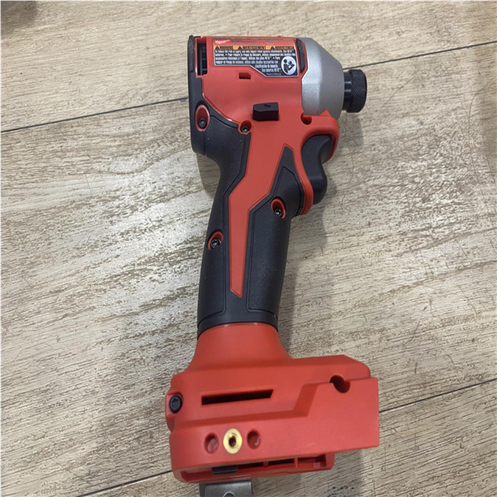 as-is Milwaukee 18V Lithium-Ion Compact Brushless Cordless 1/4 in. Impact Driver Kit