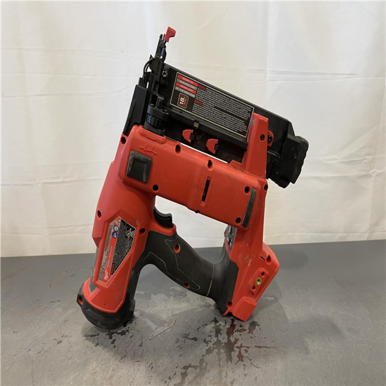 AS-IS - Milwaukee M18 FUEL 18-Volt Lithium-Ion Brushless Cordless Gen II 18-Gauge Brad Nailer