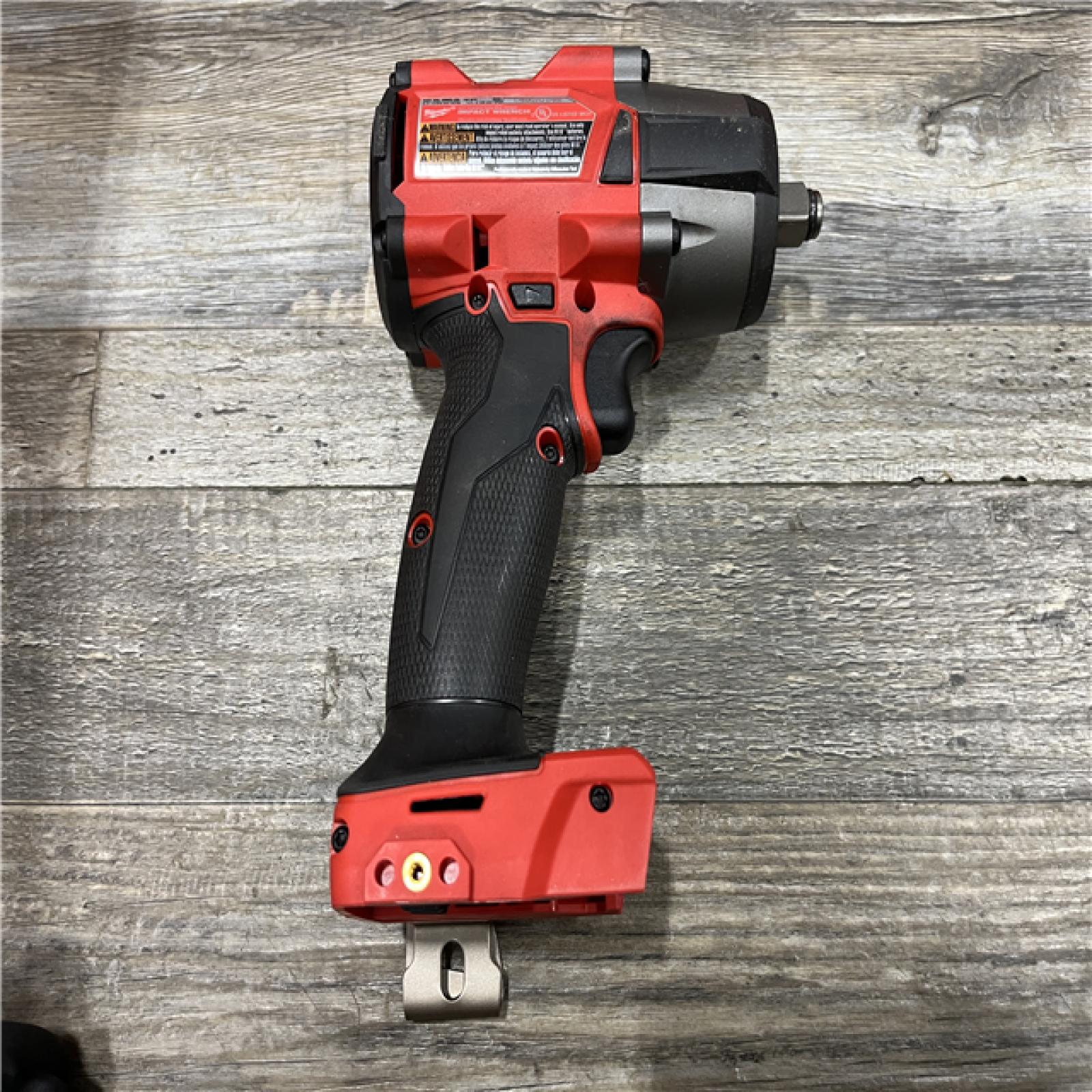 AS-IS Milwaukee FUEL 18V Lithium-Ion Brushless Cordless 1/2 in. Mid-Torque Impact Wrench with Friction Ring Kit