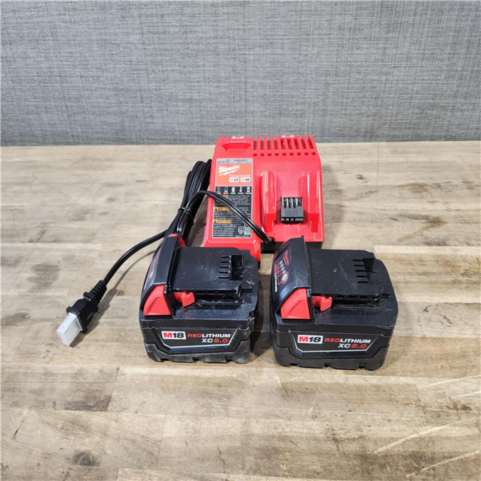 HOUSTON LOCATION - AS-IS MILWAUKEE 2 TOOL COMBO KIT W/ (2) BATTERY & CHARGER