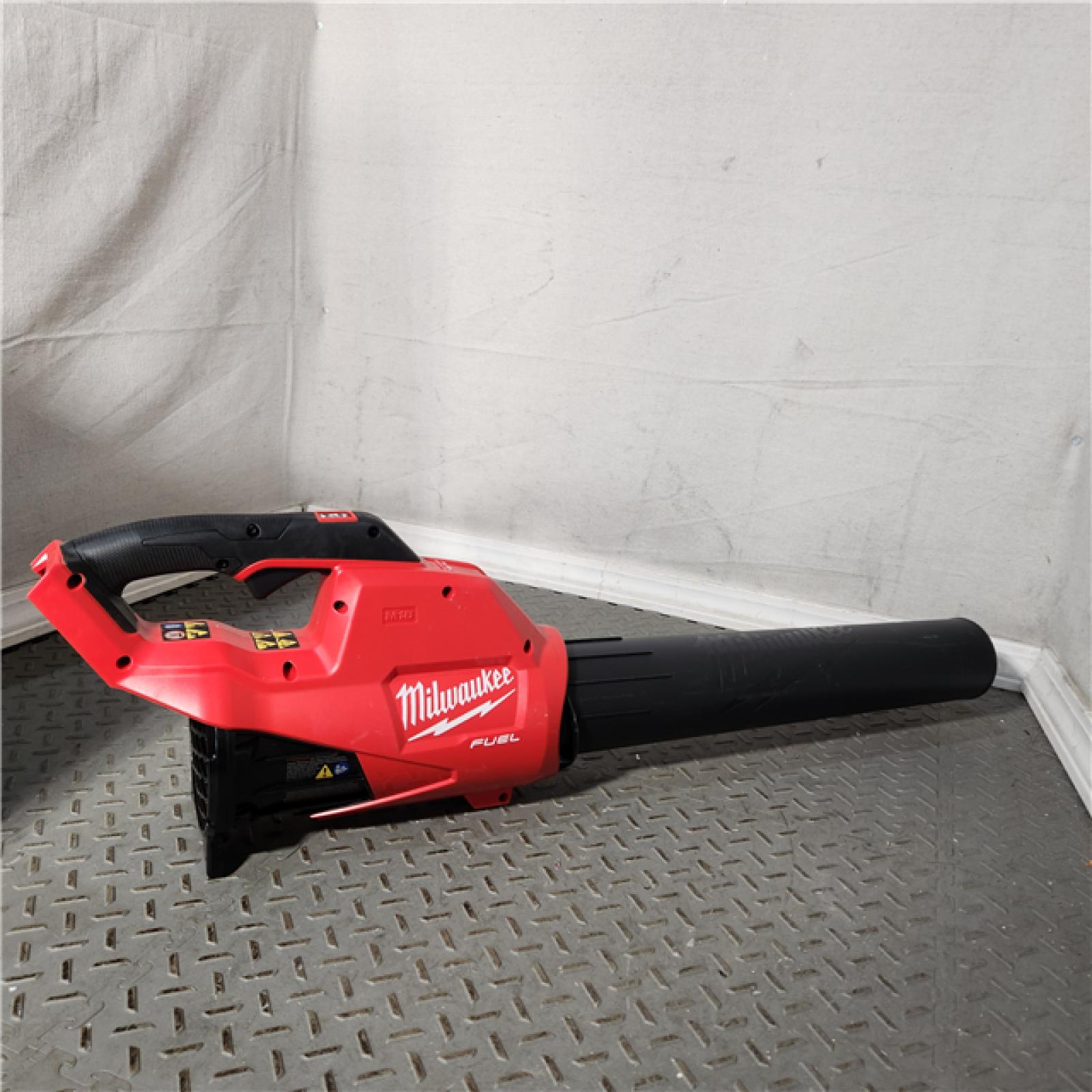 HOUSTON Location-AS-IS-Milwaukee 2727-21HDP M18 18V FUEL Lithium-Ion Brushless Cordless 2-Tool Combo Kit with 16 Chainsaw and Handheld Blower 12.0 Ah APPEARS IN NEW Condition