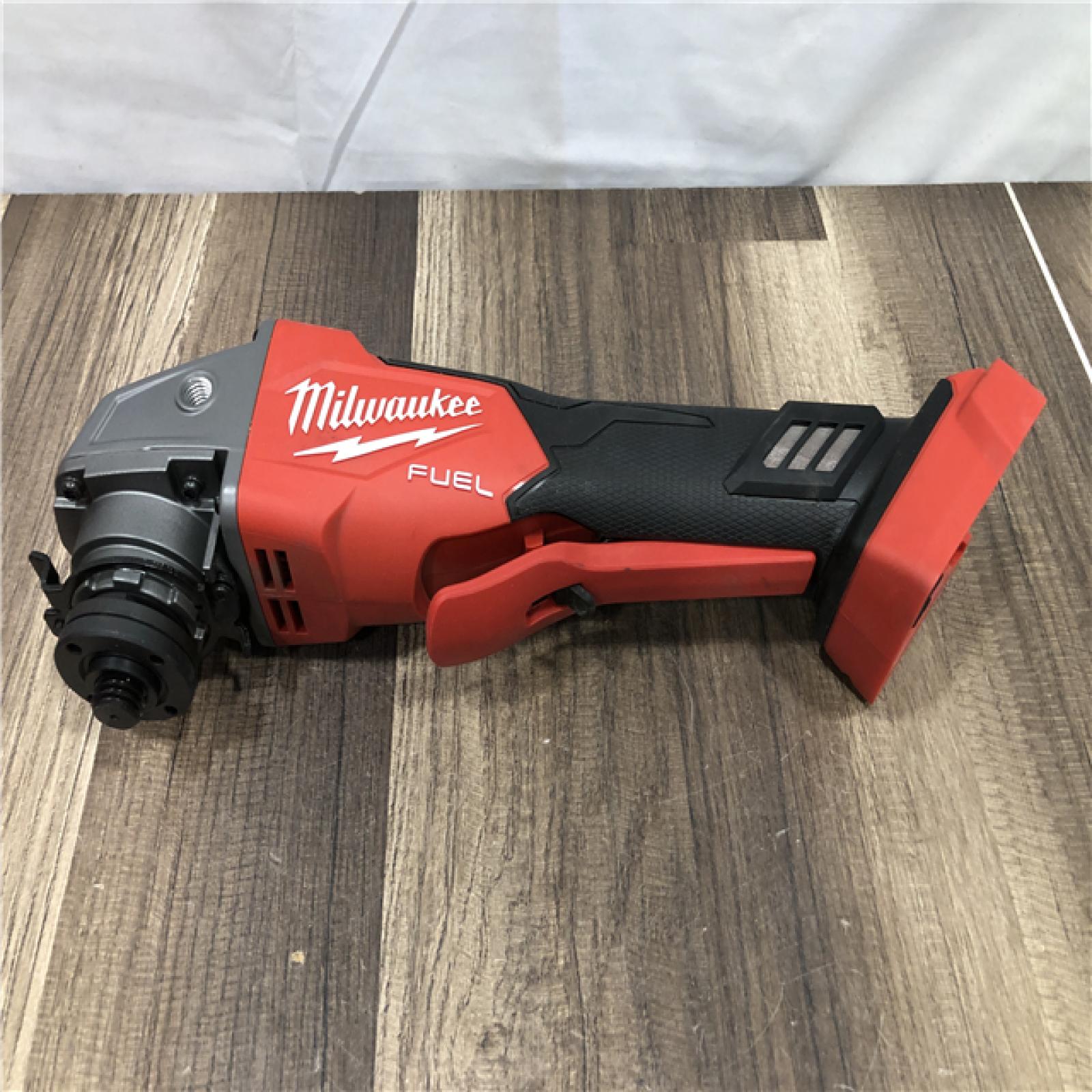 AS-IS Milwaukee FUEL 18V Lithium-Ion Brushless Cordless 4-1/2 in./5 in. Grinder with Variable Speed & Paddle Switch (Tool-Only)
