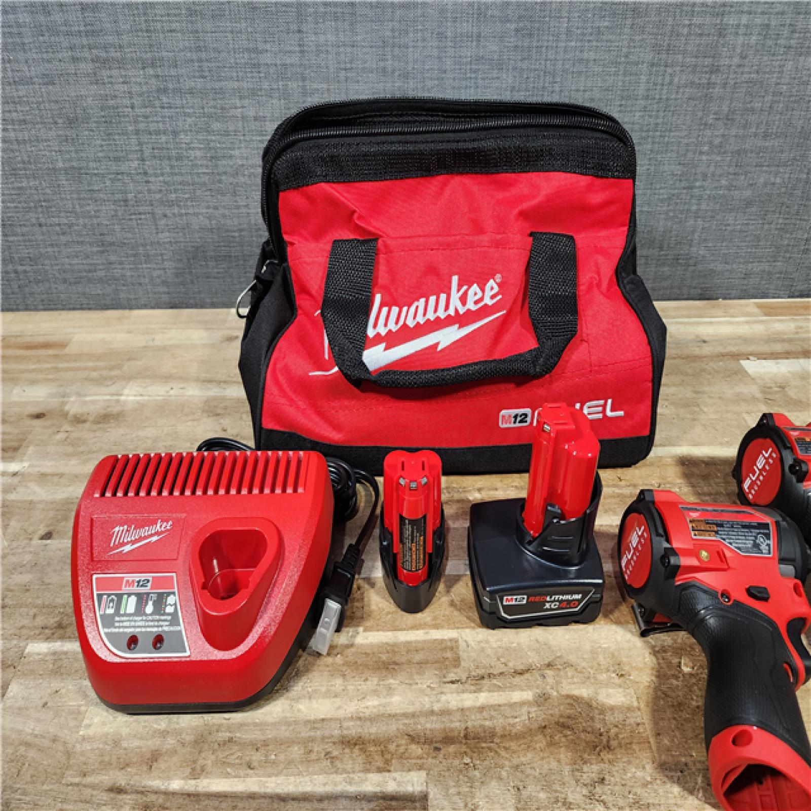HOUSTON LOCATION - AS - IS Milwaukee FUEL 12-Volt Lithium-Ion Brushless Cordless Hammer Drill and Impact Driver Combo Kit