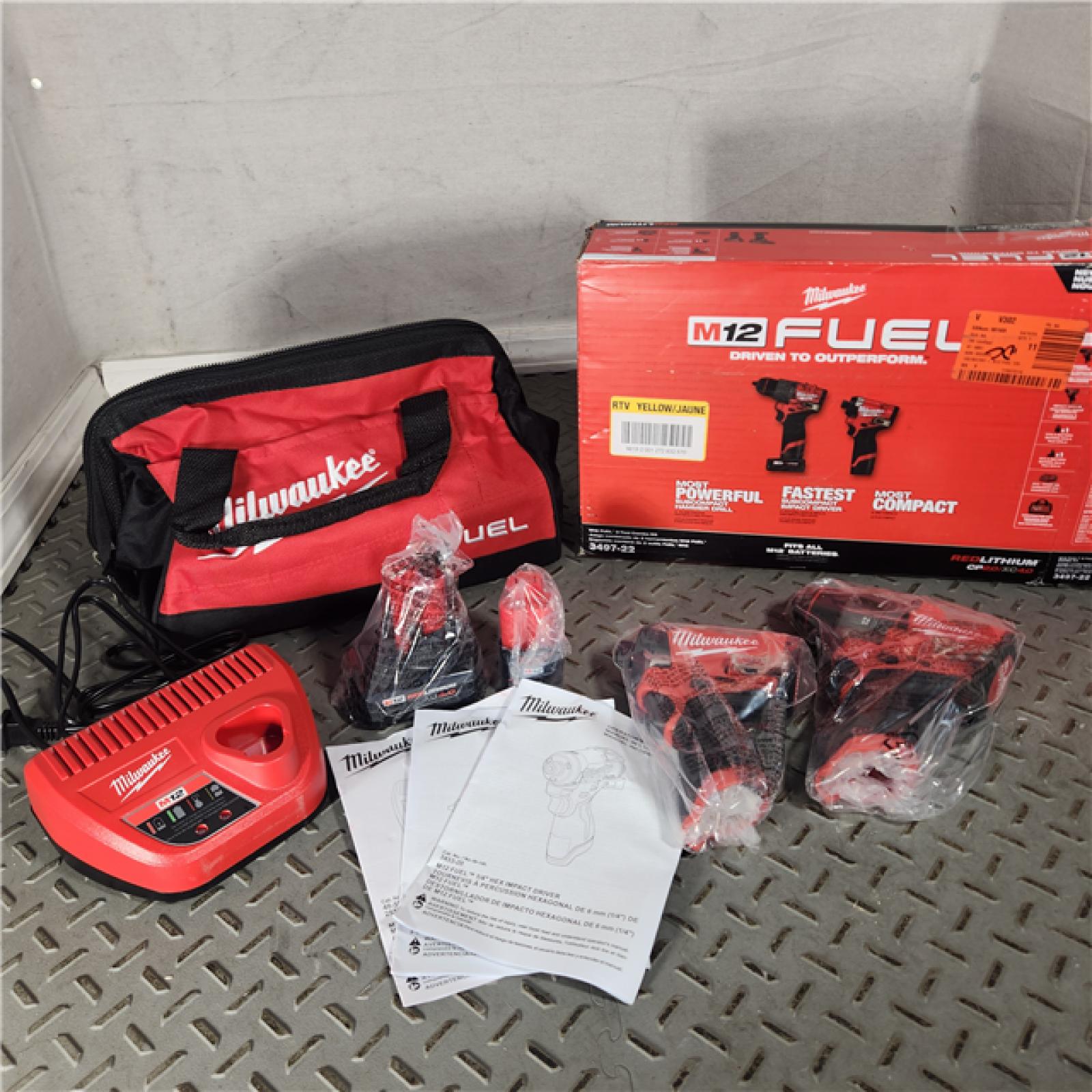 Houston Location - As-IS Milwaukee 3497-22 12V Brushless Hammer Drill and Impact Driver Combo Kit - Appears IN NEW Condition