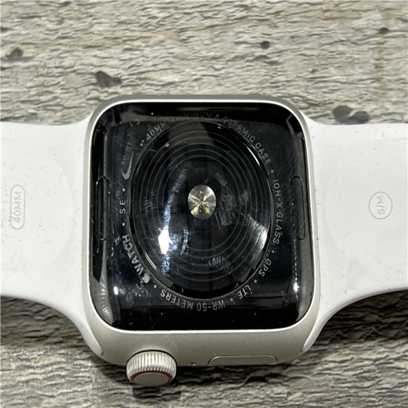AS-IS  Apple Watch SE (GPS+Cellular, 40mm) - Silver Aluminum Case - White Sport Band