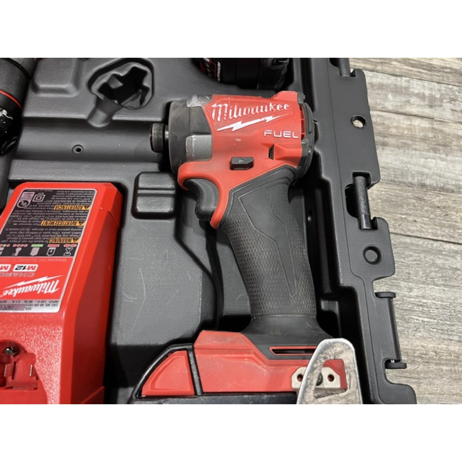 AS-IS Milwaukee FUEL 18V Lithium-Ion Brushless Cordless Hammer Drill and Impact Driver Combo Kit