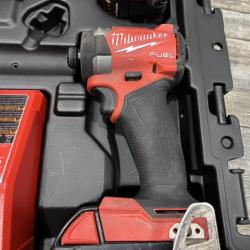 AS-IS Milwaukee FUEL 18V Lithium-Ion Brushless Cordless Hammer Drill and Impact Driver Combo Kit
