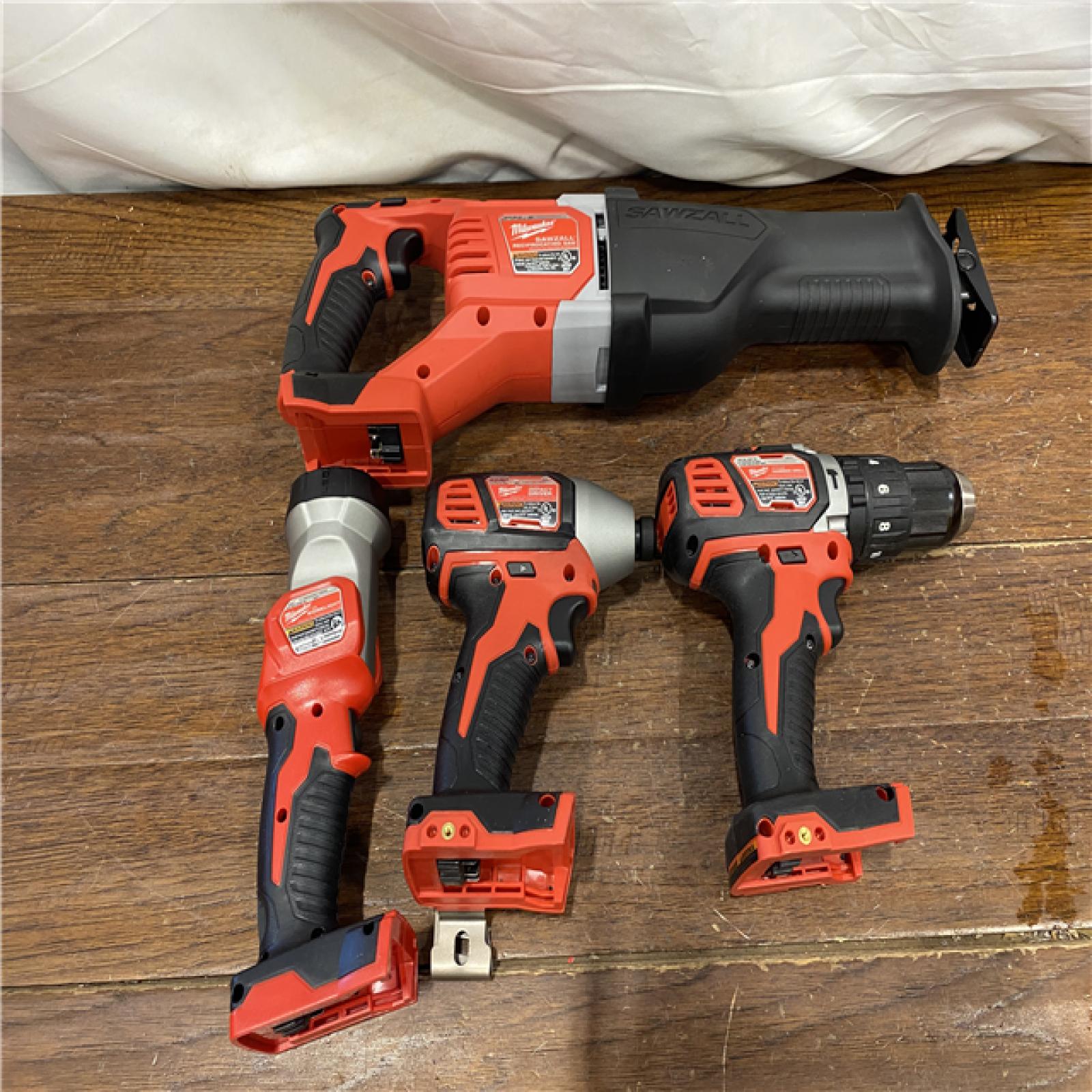 AS-IS MILWAUKEE M18 18V Lithium-Ion Cordless Combo Tool Kit with Two 3.0Ah Batteries, 1-Charger, 1-Tool Bag (4-Tool)