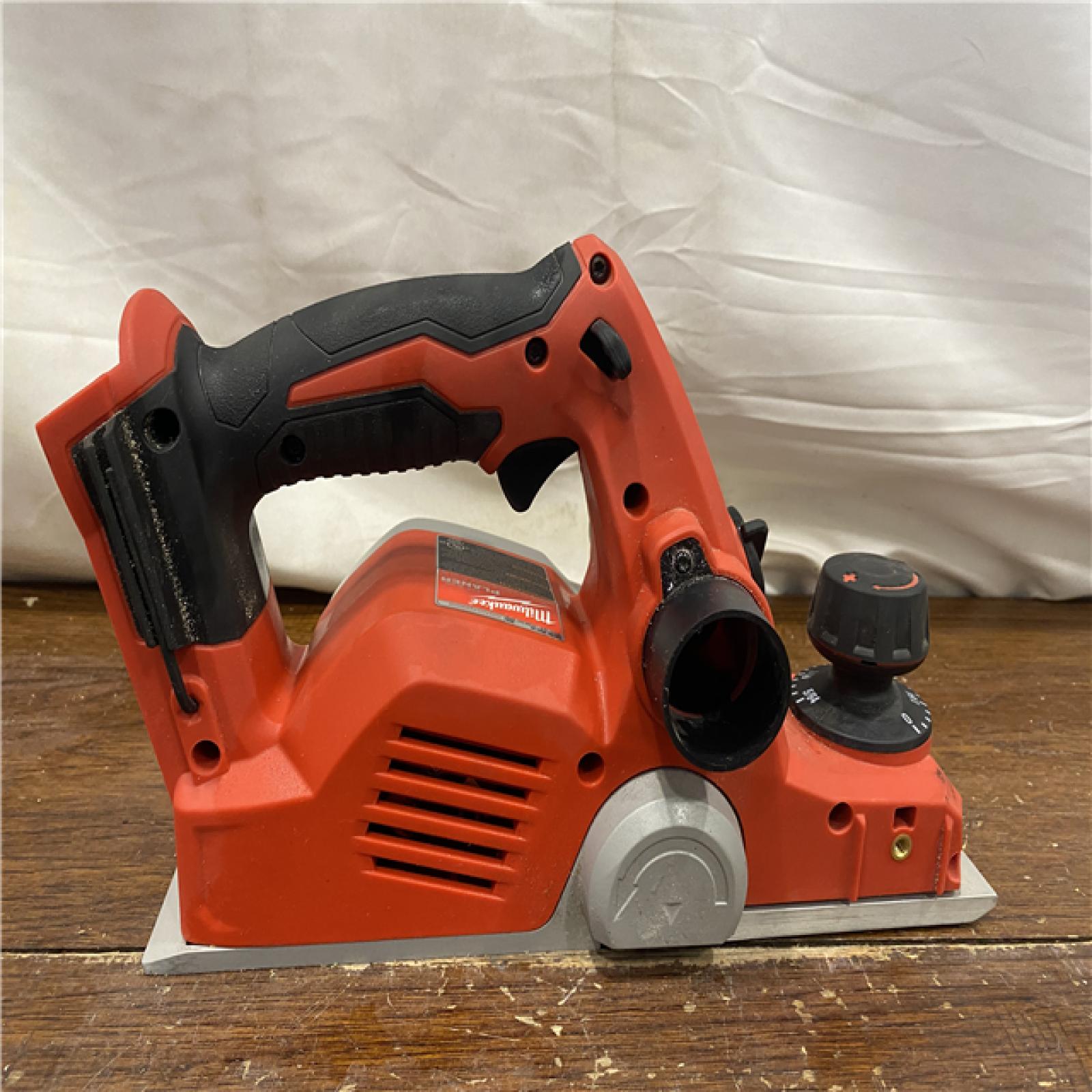 AS-IS Milwaukee M18 18-Volt Lithium-Ion Cordless 3-1/4 in. Planer (Tool-Only)