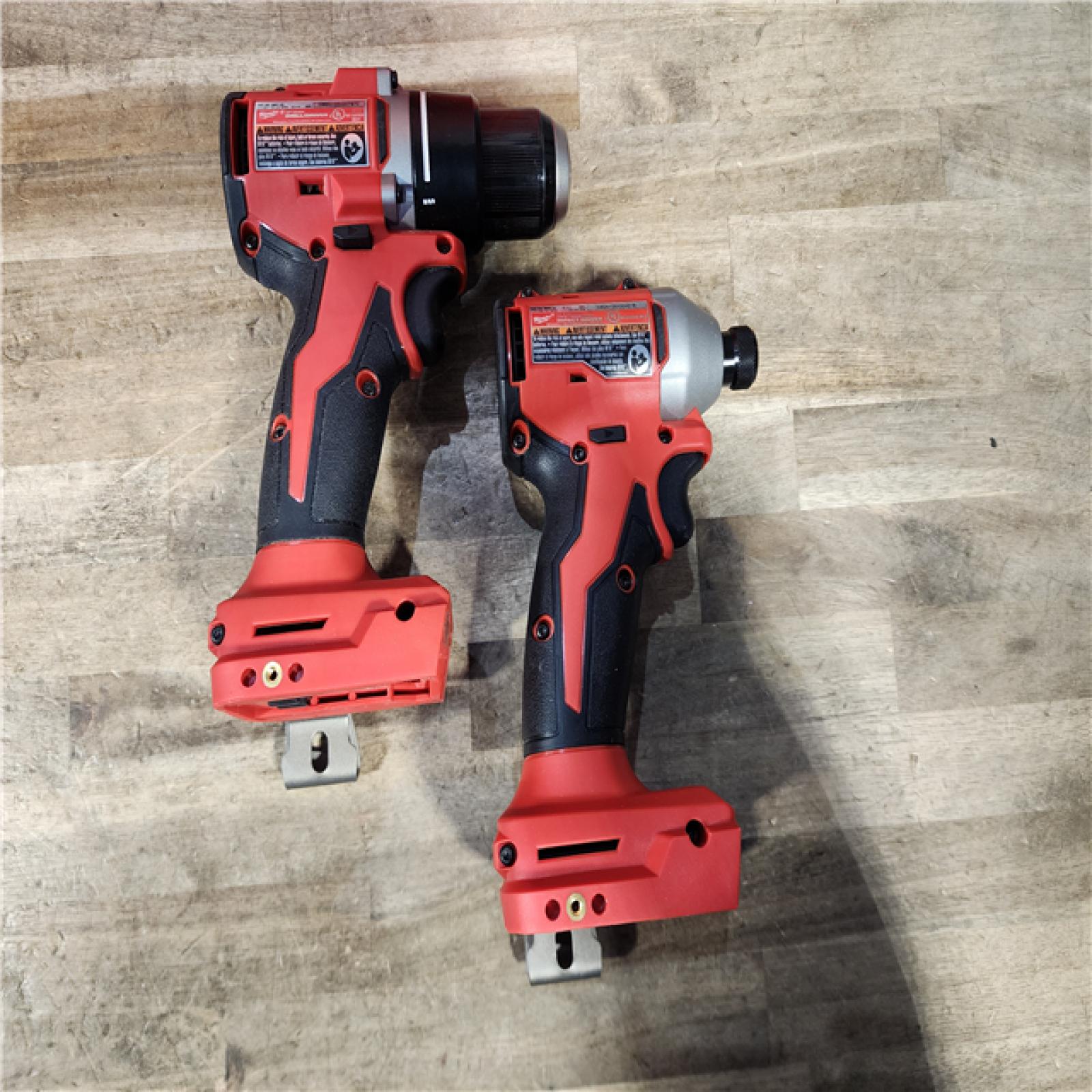 HOUSTON LOCATION - AS-IS Milwaukee M18 18V Lithium-Ion Brushless Cordless Compact Drill/Impact Combo Kit (2-Tool) W/(2) 2.0 Ah Batteries  Charger & Bag