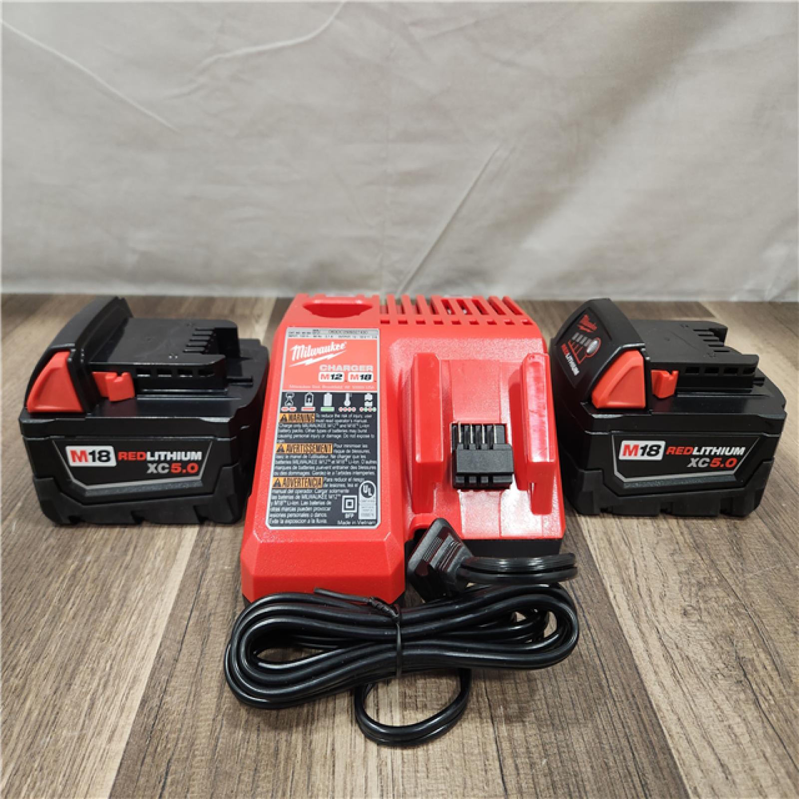 AS-IS - M18 18-Volt Lithium-Ion XC Starter Kit with Two 5.0Ah Batteries and Charger