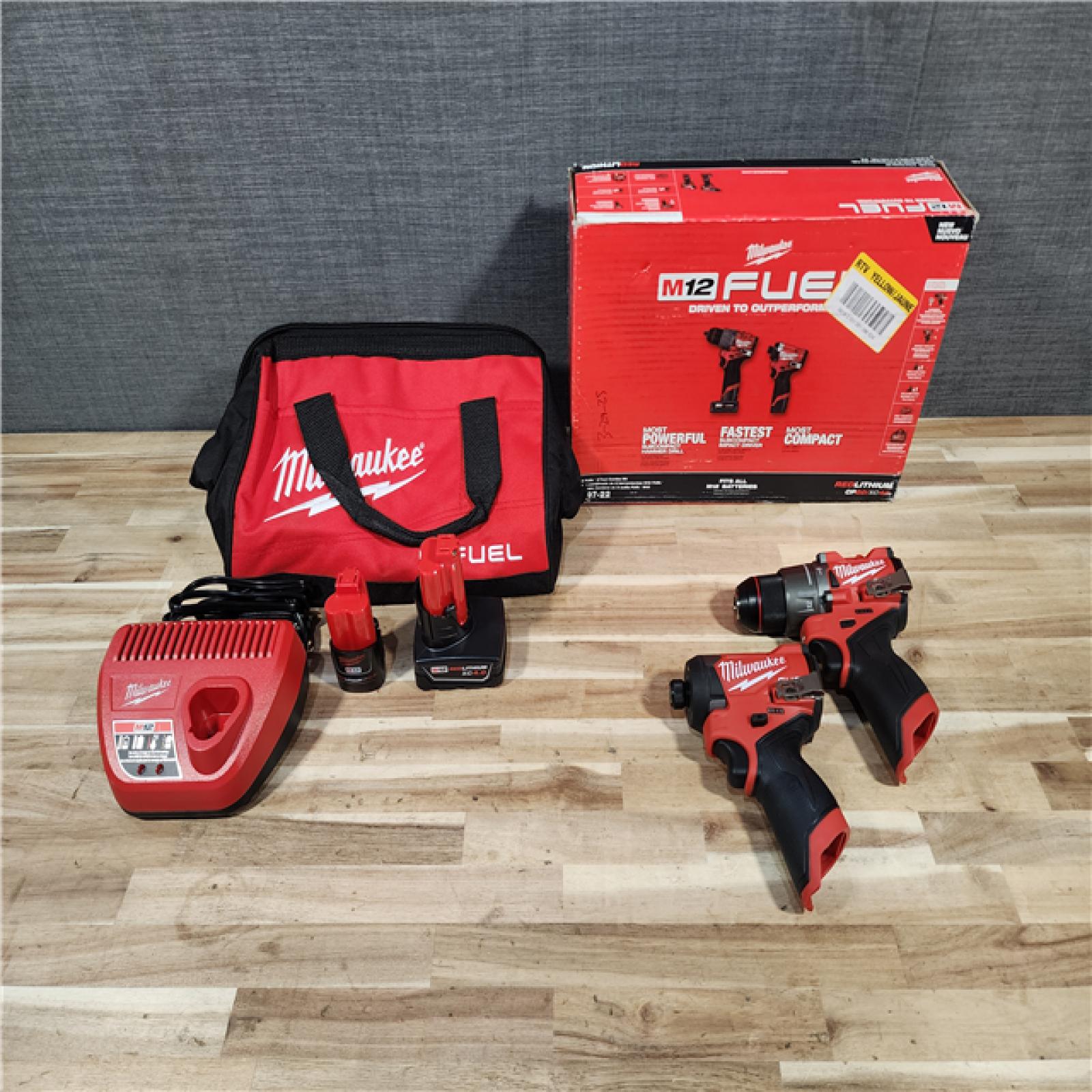 HOUSTON LOCATION - AS-IS (APPEARS LIKE NEW) Milwaukee FUEL 12-Volt Lithium-Ion Brushless Cordless Hammer Drill and Impact Driver Combo Kit