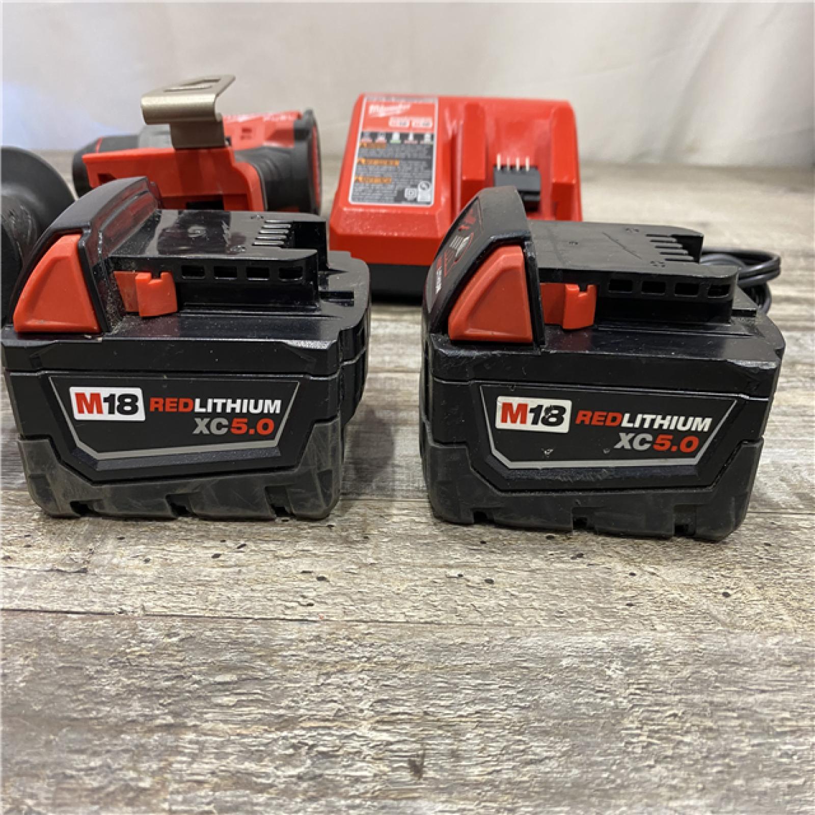 AS-IS Milwaukee FUEL 18V Lithium-Ion Brushless Cordless 1/2 in. Hammer Drill Driver Kit