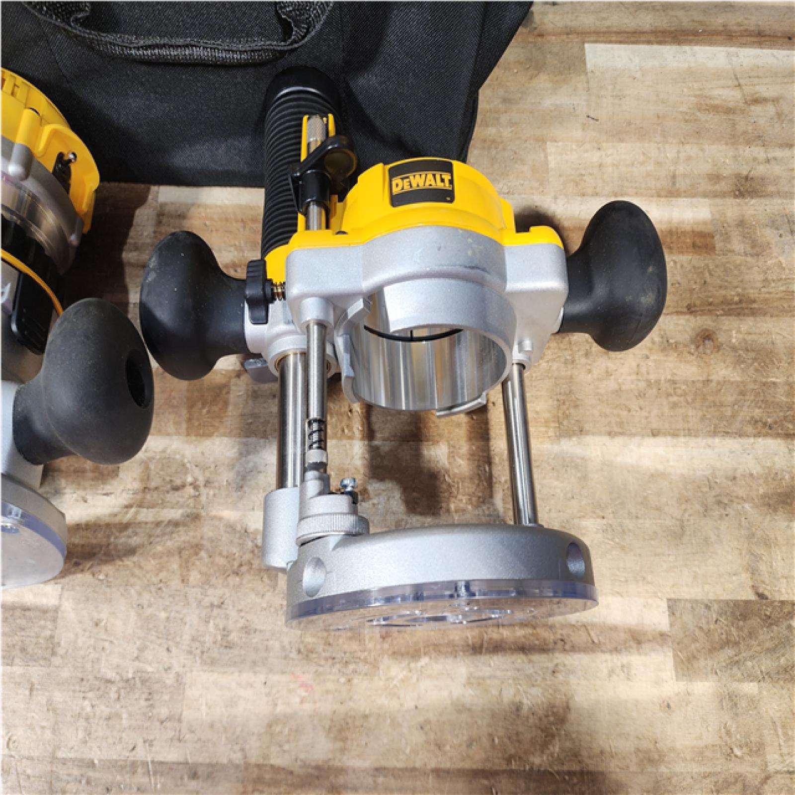 HOUSTON LOCATION - AS - IS DEWALT 12 Amp Corded 2-1/4 Horsepower Fixed and Plunge Base Router Kit